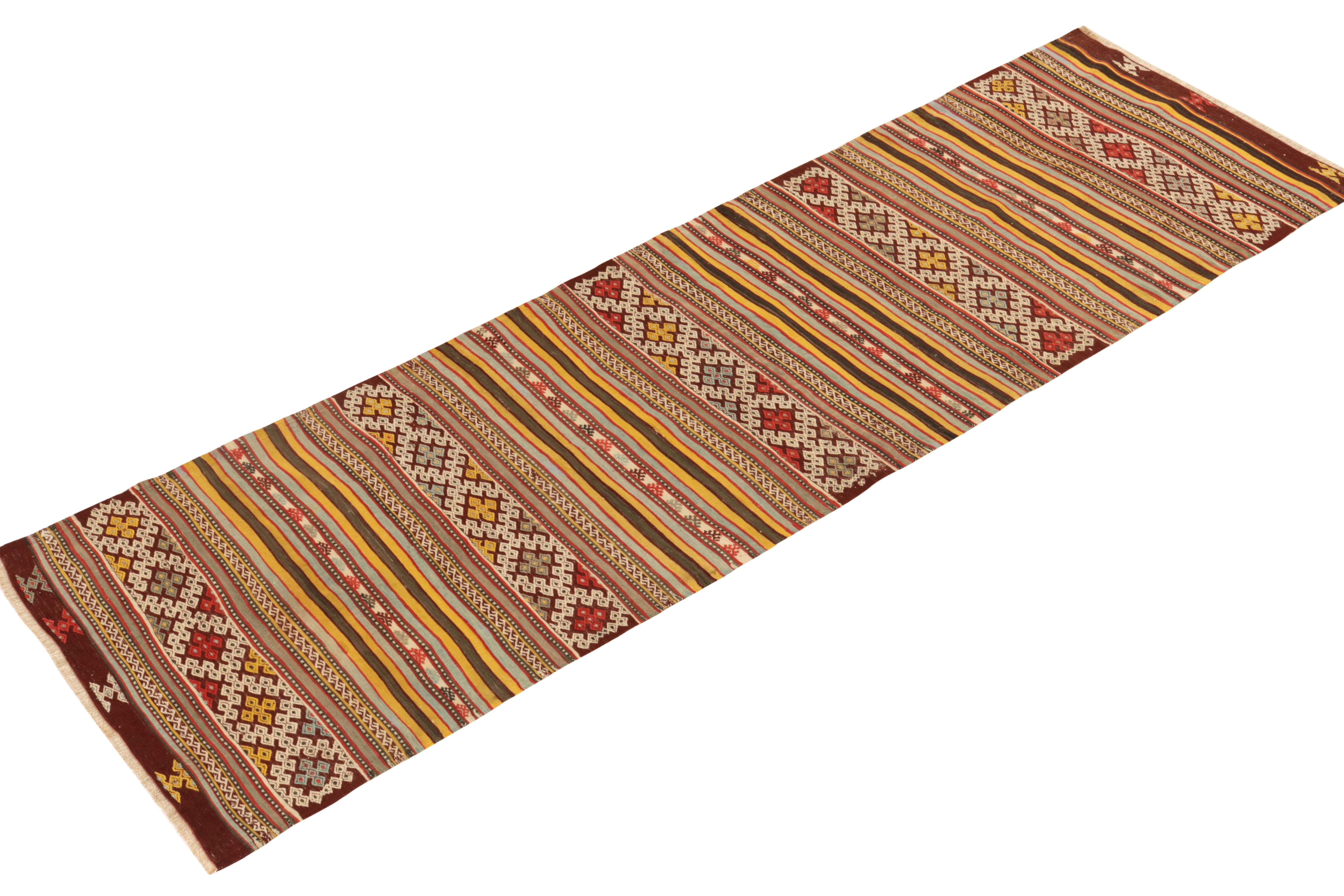 Hand-Knotted Vintage Turkish Kilim runner in Yellow, Red, Geometric Pattern by Rug & Kilim For Sale