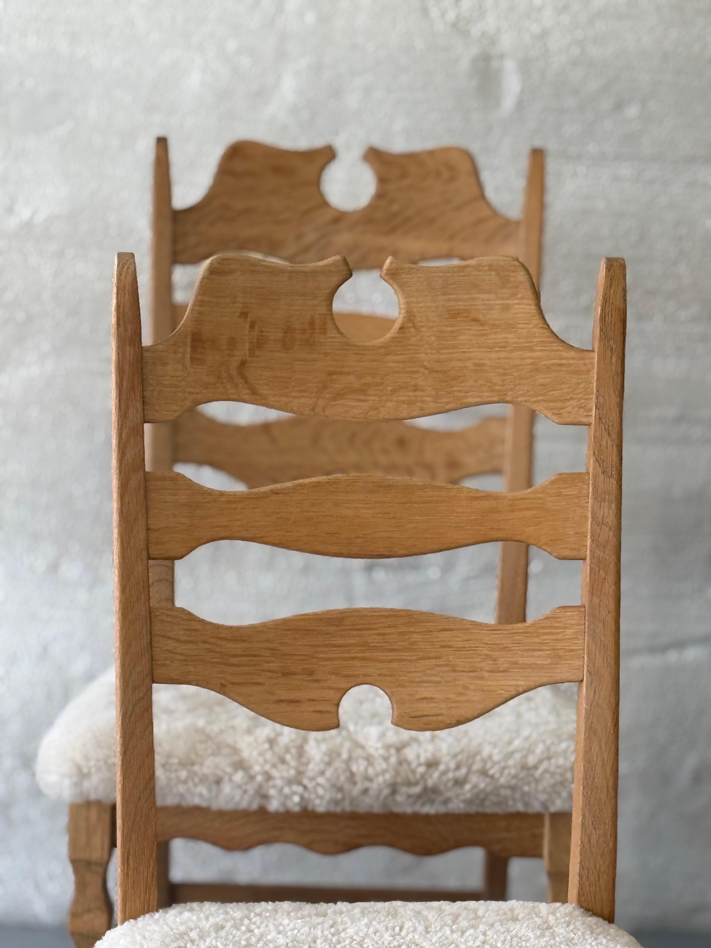 Danish Vintage Henning Kjærnulf Oak and Sheepskin Dining Chairs, Denmark 1970