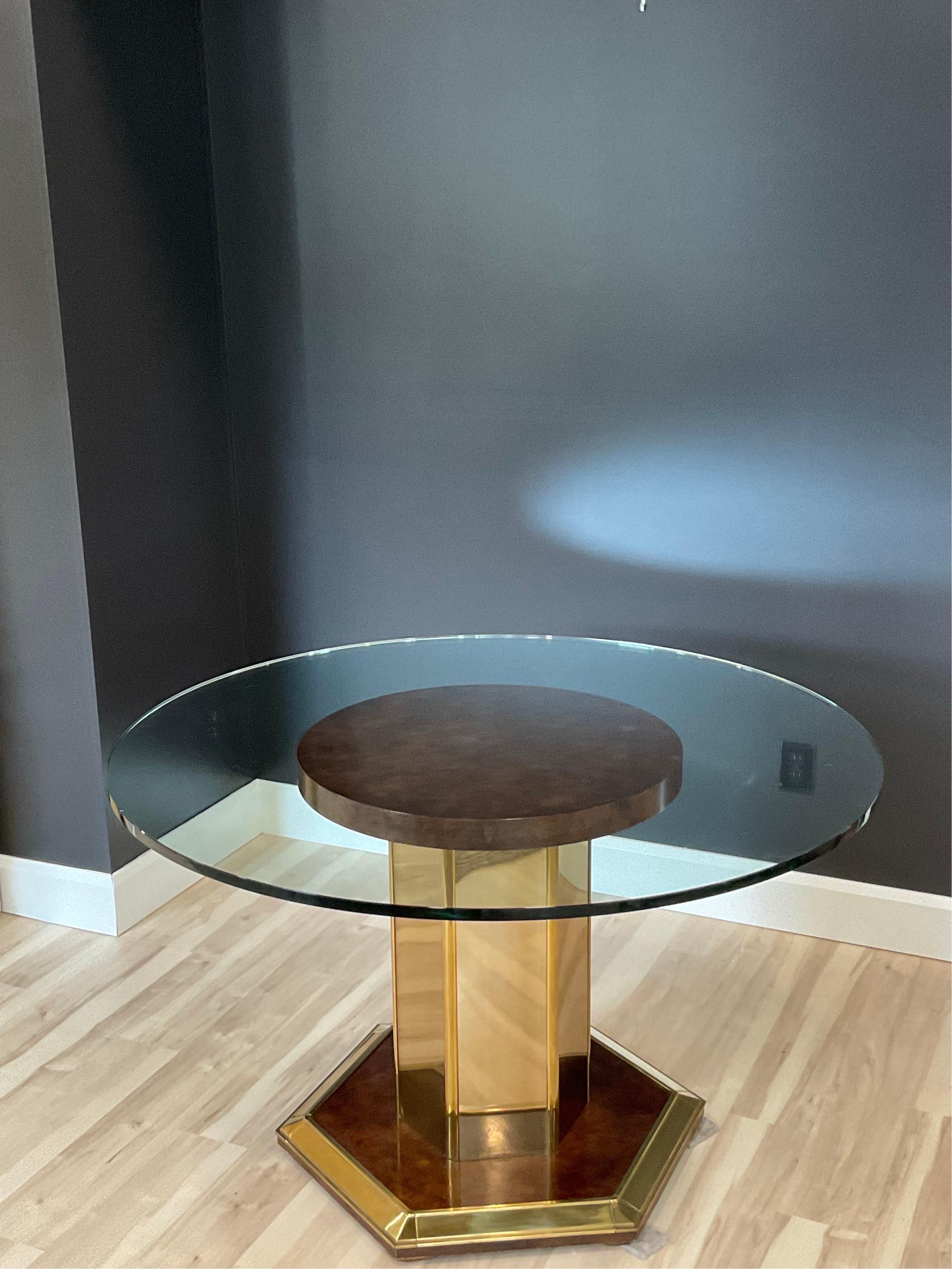 Spectacular MCM Henredon round burl wood, brass and glass dining table. Just a beauty. Pictured with a 50” top however the original 60” glass top comes with the table. Stunner in person.


Condition Disclosure:
Please understand nearly all of