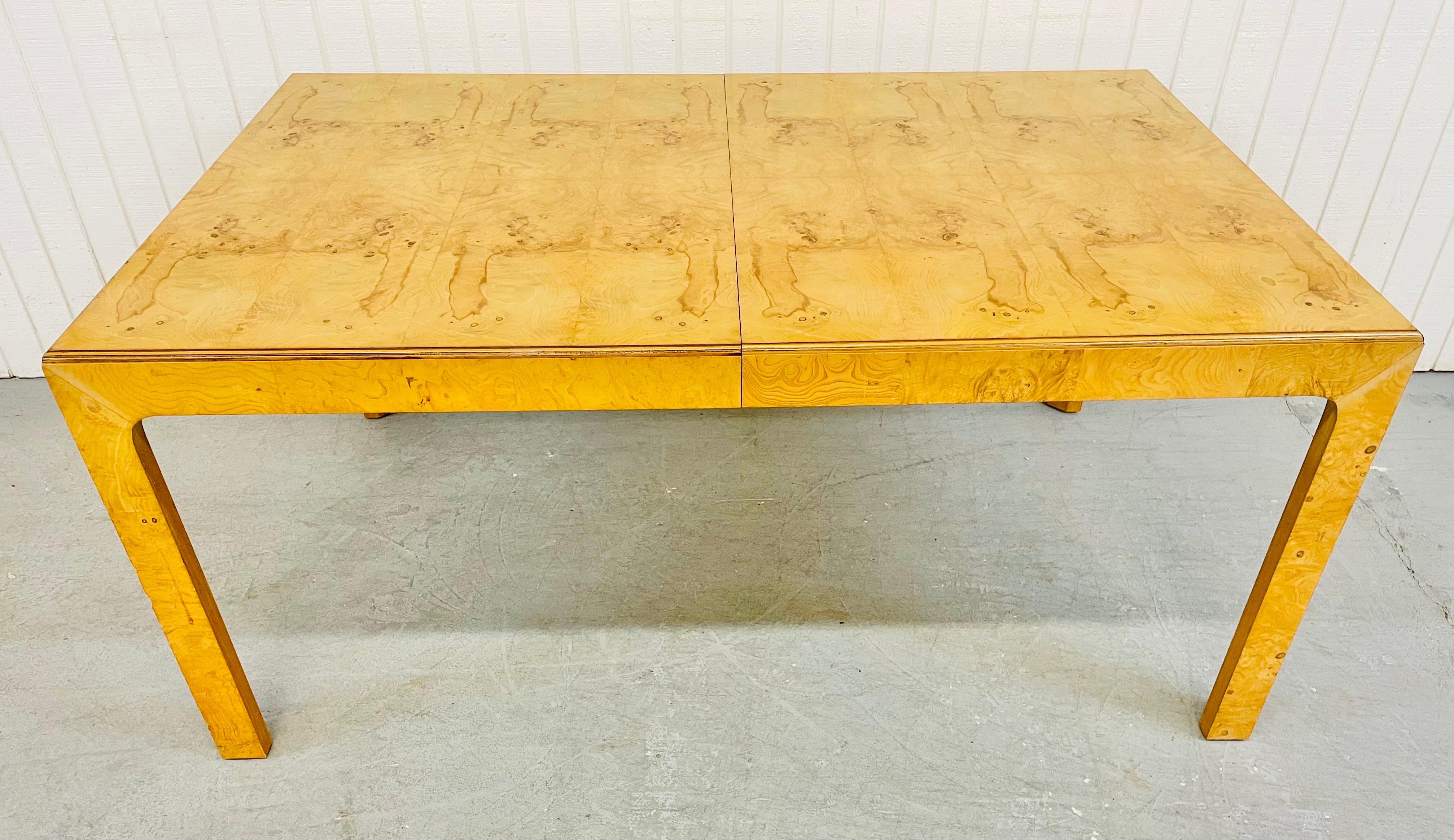 This listing is for a vintage Henredon Burled Wood Dining Table. Featuring a beautiful rectangular burled wood top, four burled wood legs, and two leaves that extend the table up to 110” L.