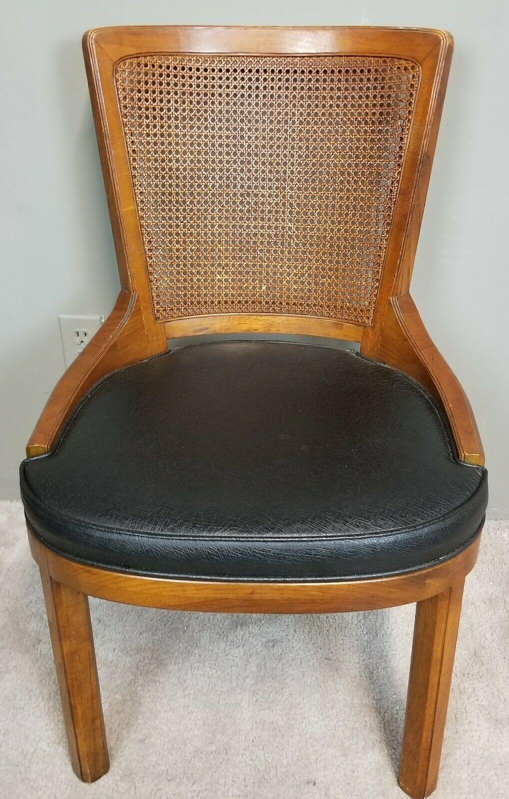 Offering One Of Our Recent Palm Beach Estate fine Furniture Acquisitions Of A 
Vintage Henredon cane back dining desk chair 1970s Model 28-5001

Approximate Measurements in Inches
32 1/2
