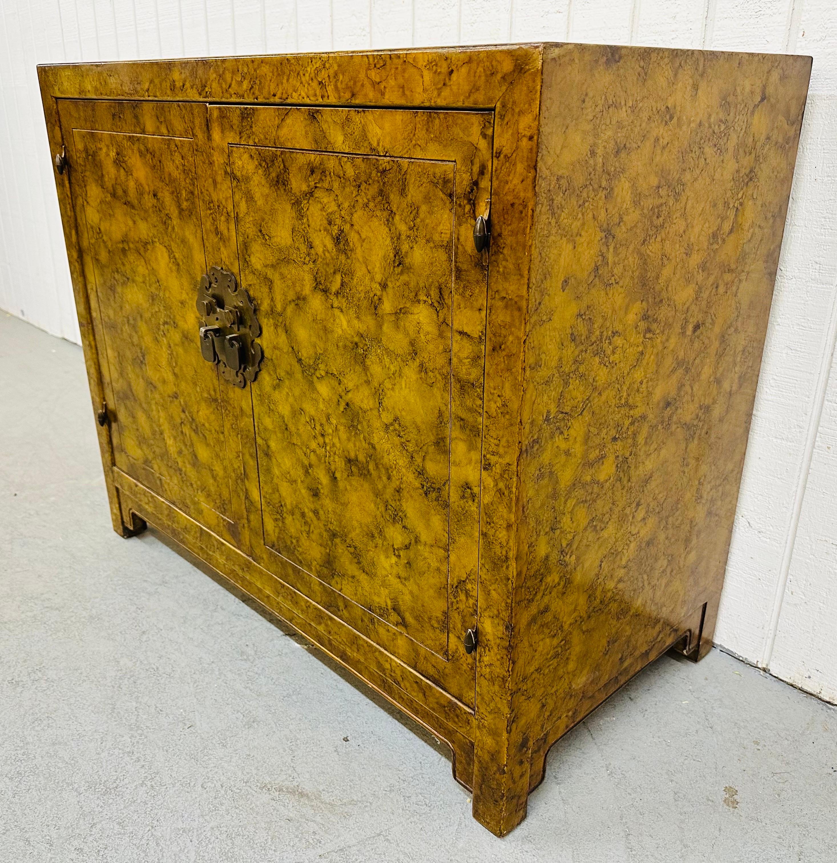 This listing is for a vintage Henredon Faux Tortoise Shell Commode. Featuring a straight line design, two doors that open up to storage space, single drawer that pulls out, original brass hardware, and a beautiful tortoise shell style finish. This