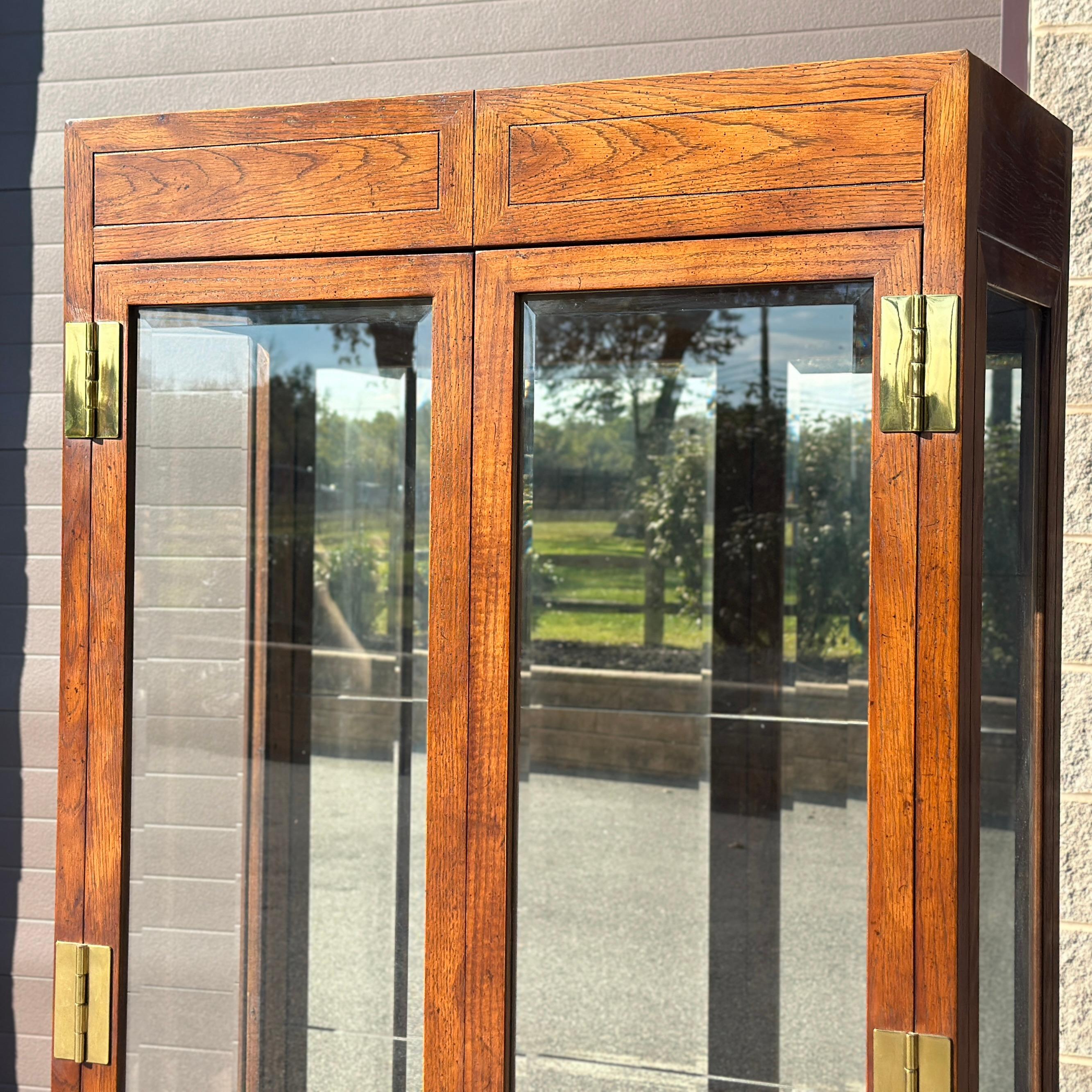 American Vintage Henredon Scene One Campaign Style Lighted Curio Display Cabinet Bookcase