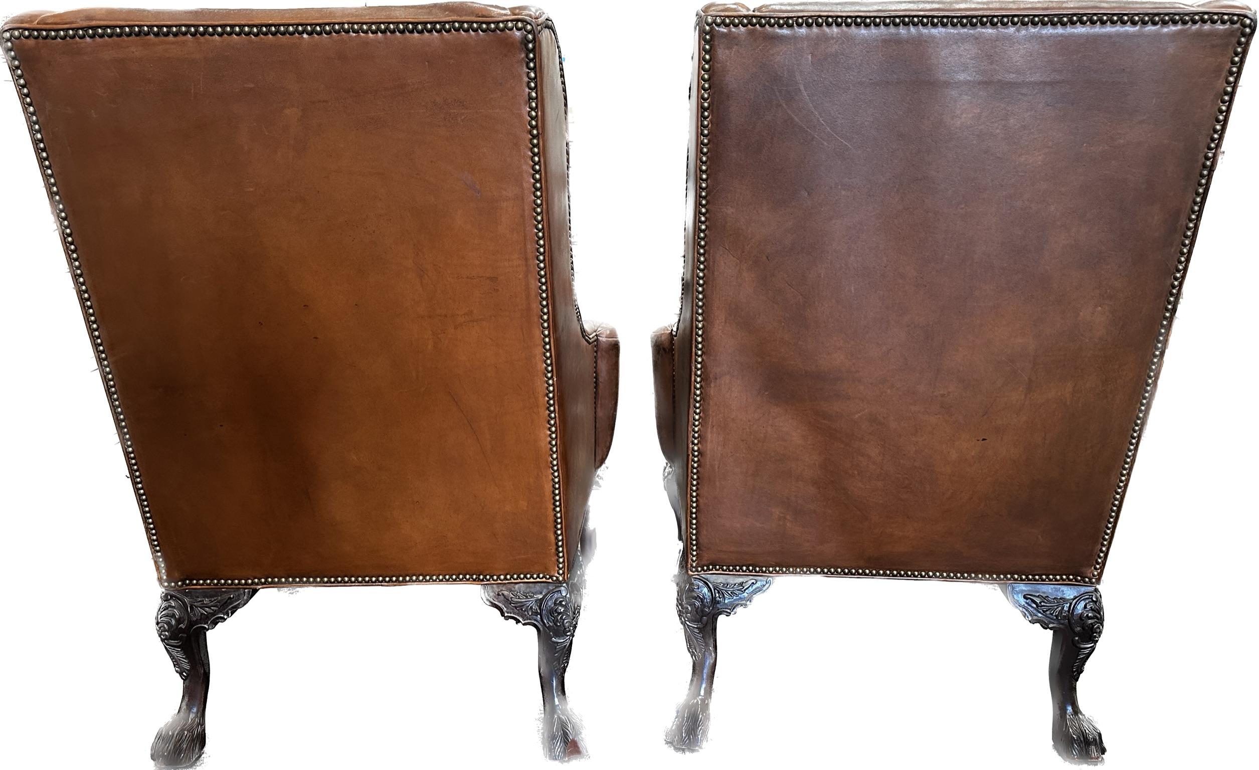 Pair of Vintage Henredon brown leather wingback armchairs, USA, circa 1970-1980 Well-built and well-known, Henredon armchairs have stood the test of time.  Sold in Vintage condition, these chairs are extremely comfortable and have the look of aged