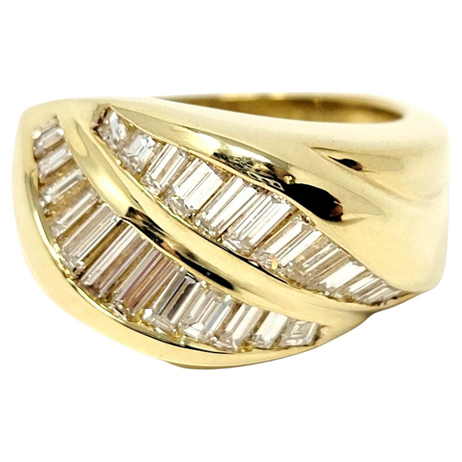 Ring size: 6.75

Stunning vintage Henri Carre baguette diamond band ring in polished 18 karat yellow gold. This unique piece features curved lines and ridged detailing paired with two sleek rows of graduated icy white baguette diamonds. The natural