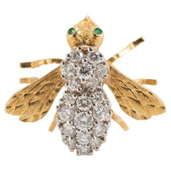Spilla d'epoca Herbert Rosenthal in oro 18 carati con diamante e occhi di smeraldo