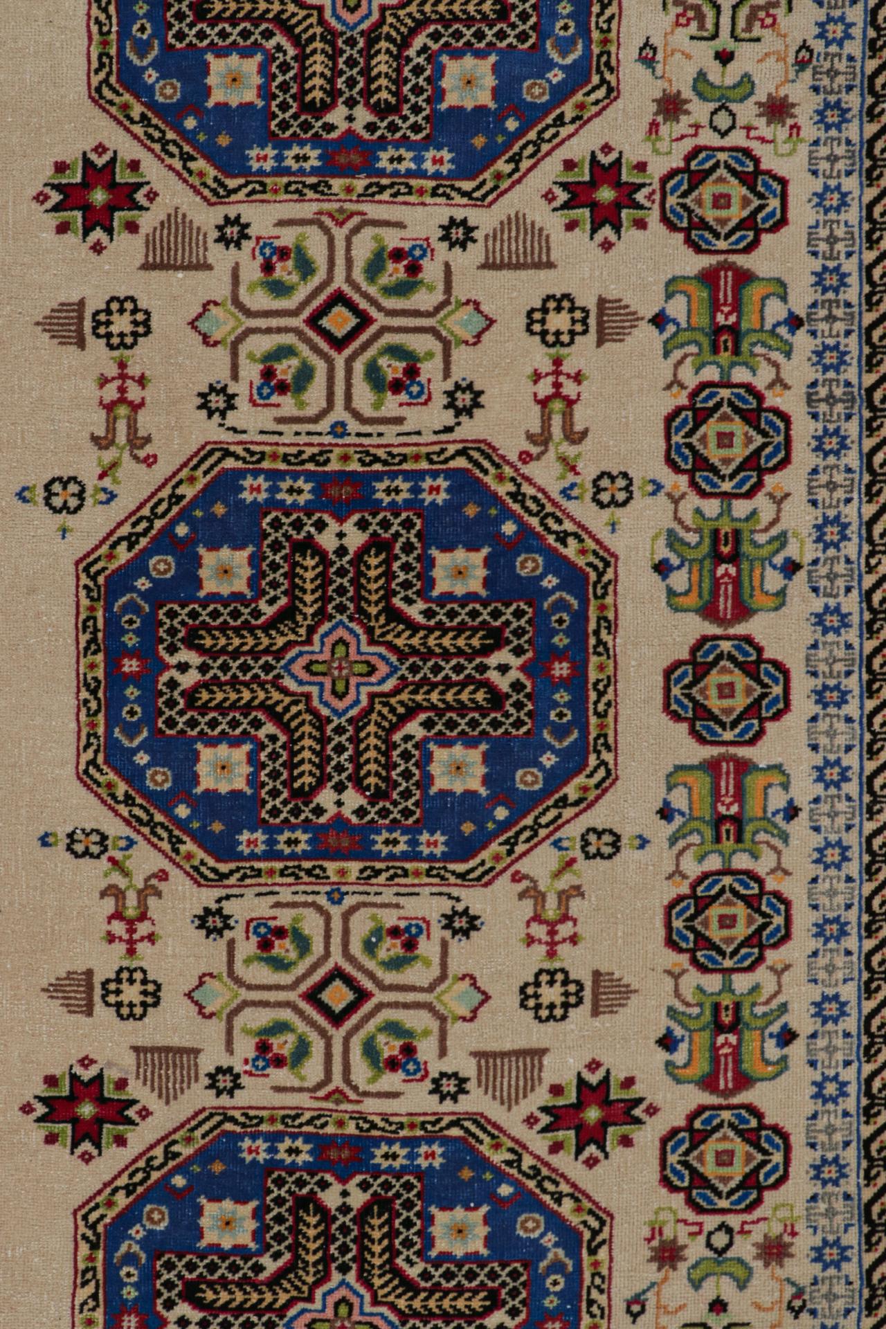 Wool Vintage Hereke rug in Beige, Blue and Gold Geometric Patterns by Rug & Kilim For Sale