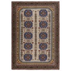Tapis Hereke vintage à motifs géométriques beige, bleu et or par Rug & Kilim