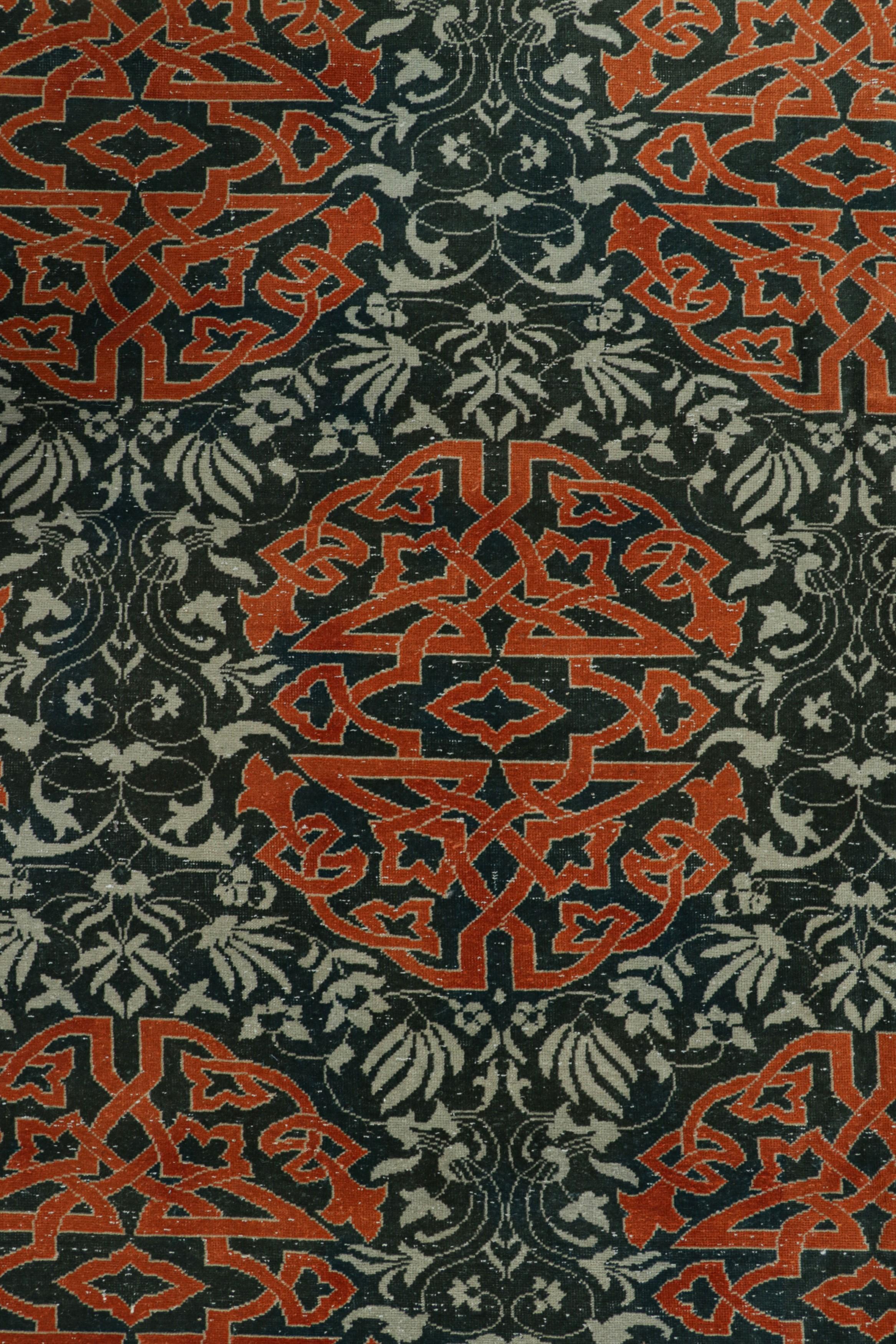 Milieu du XXe siècle Tapis Hereke vintage bleu avec médaillons arabesques orange  Rug & Kilim en vente