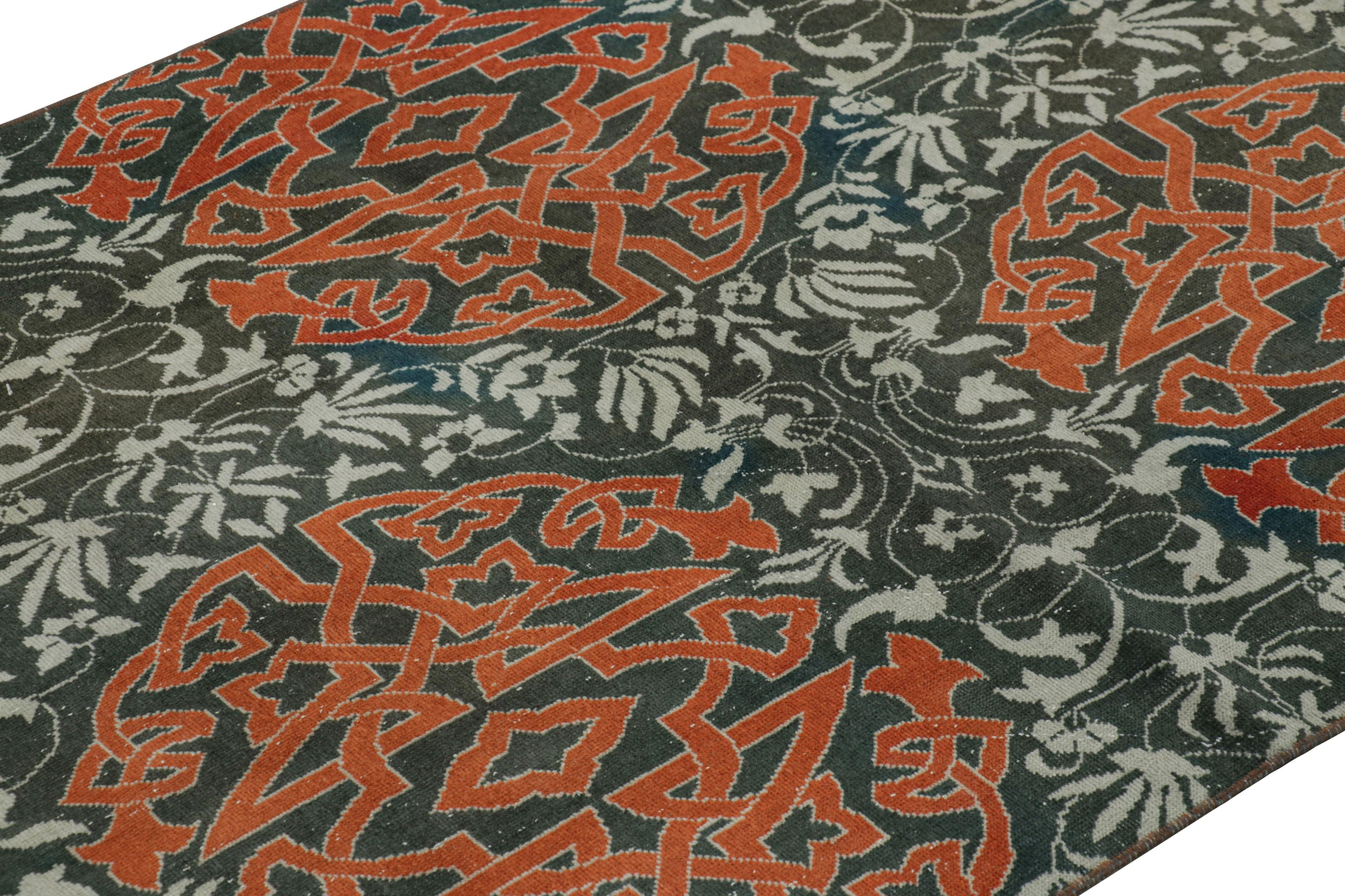 Made with hand-knotted wool in Turkey circa 1950-1960, this 5x3 vintage Hereke rug is from an exciting new curation from Rug & Kilim, enjoying large-scale arabesque medallions and floral patterns on a blue field with a borderless design. 

On the
