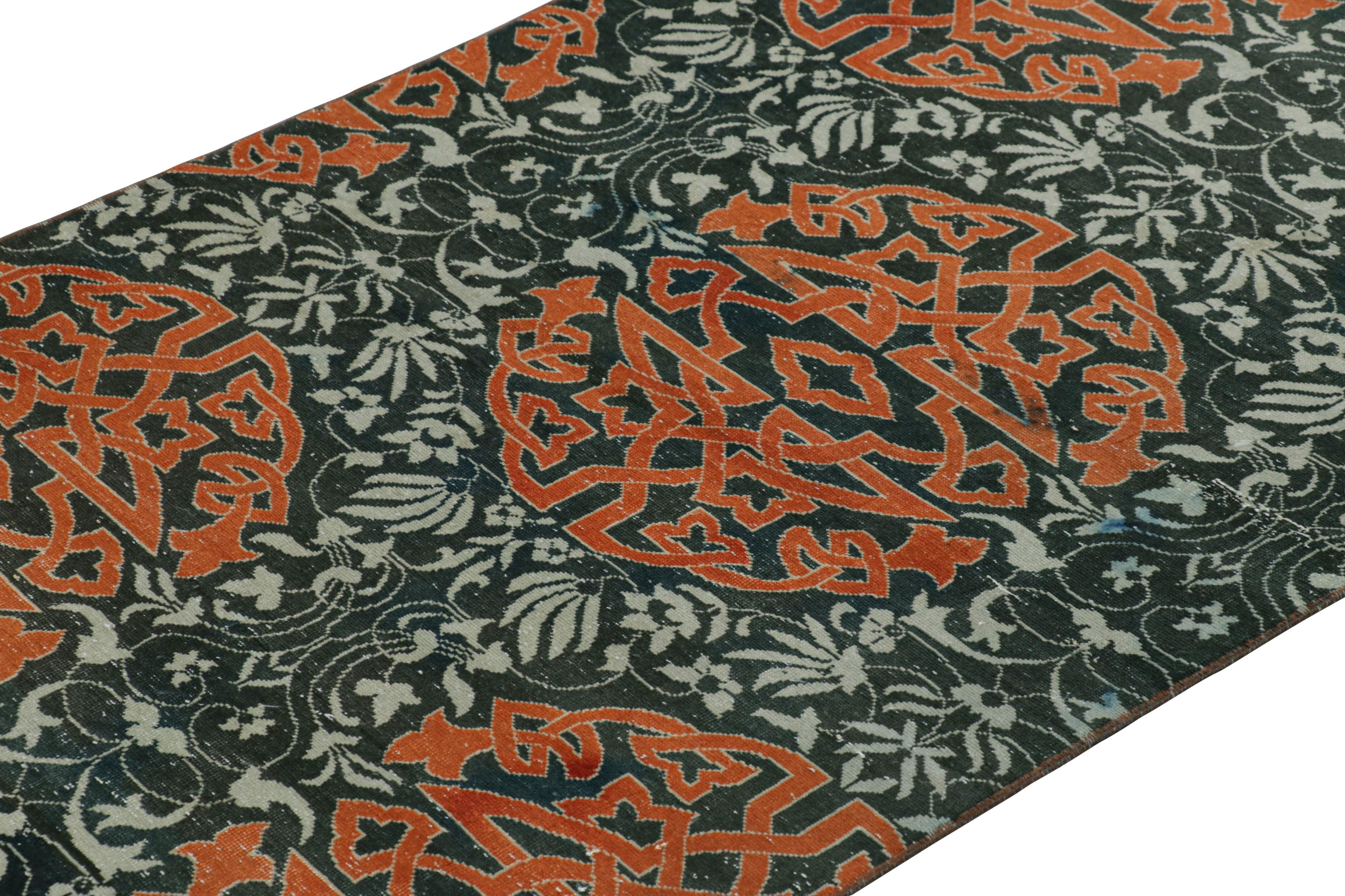 Made with hand-knotted wool in Turkey circa 1950-1960, this 5x3 vintage Hereke rug is from an exciting new curation from Rug & Kilim, enjoying large-scale arabesque medallions and floral patterns on a blue field with a borderless design. 

On the