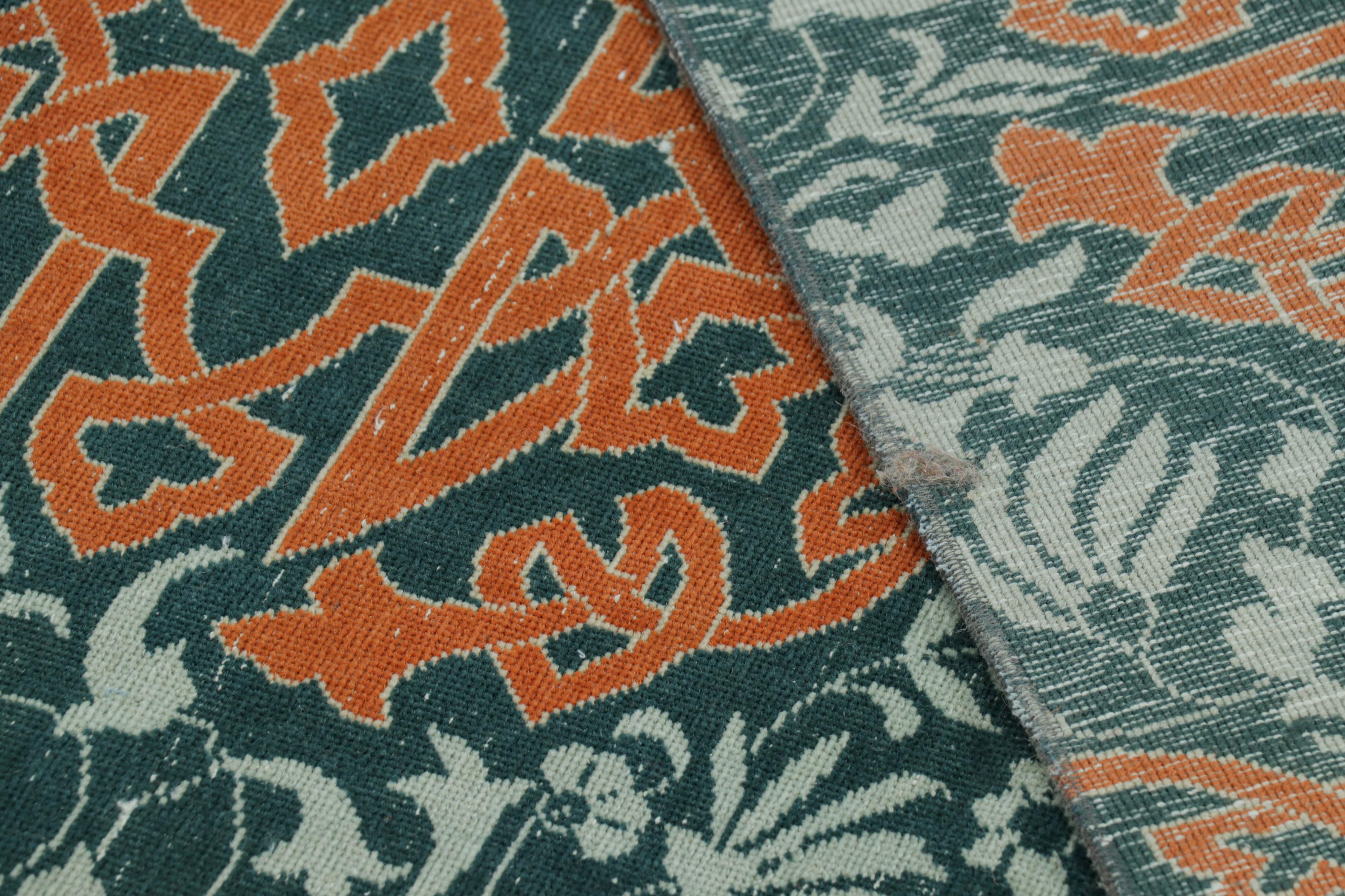 Lana Tappeto vintage Hereke in verde acqua con medaglioni arabescati arancioni  Rug & Kilim in vendita