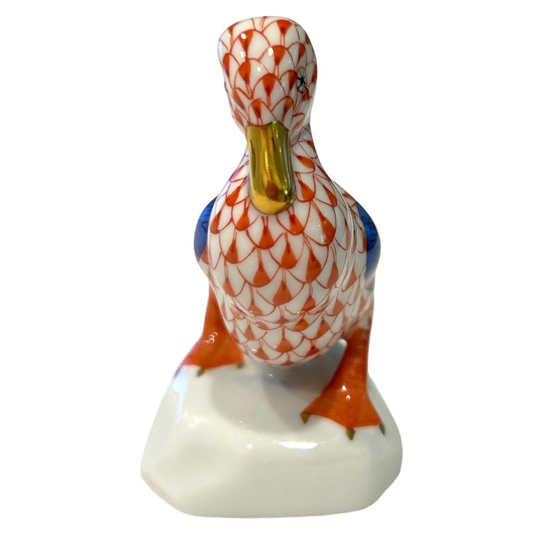Excellent condition~no chips or cracks! Each Herend figurine is brought to life by the skilled hands of artisans crafting and hand painting these charming porcelain creatures made in Hungary; trimmed in 24k gold; rust/orange fishnet motif; wings