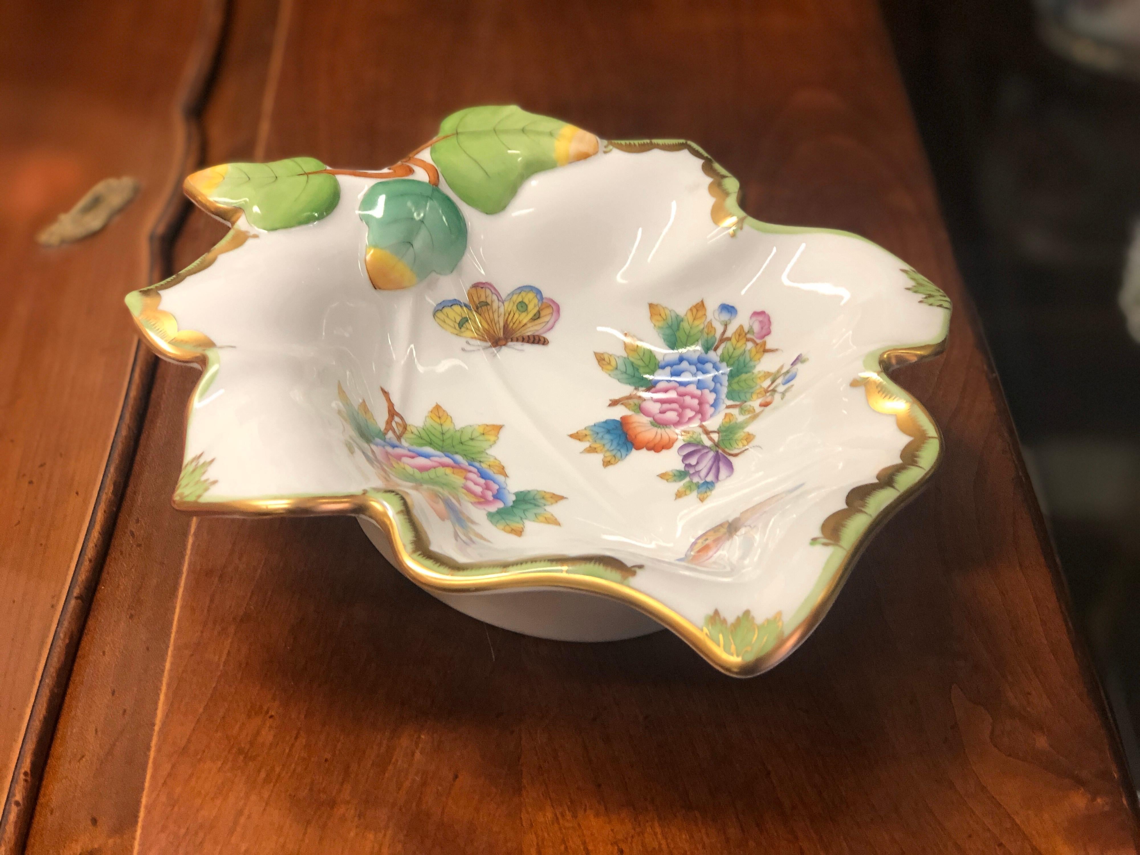 This vintage Herend Queen Victoria design is painted with peony flowers and butterflies. This leaf dish is an ideal choice to all Queen Victoria coffee or tea sets.
Excellent condition.
Hungary, circa 1940.