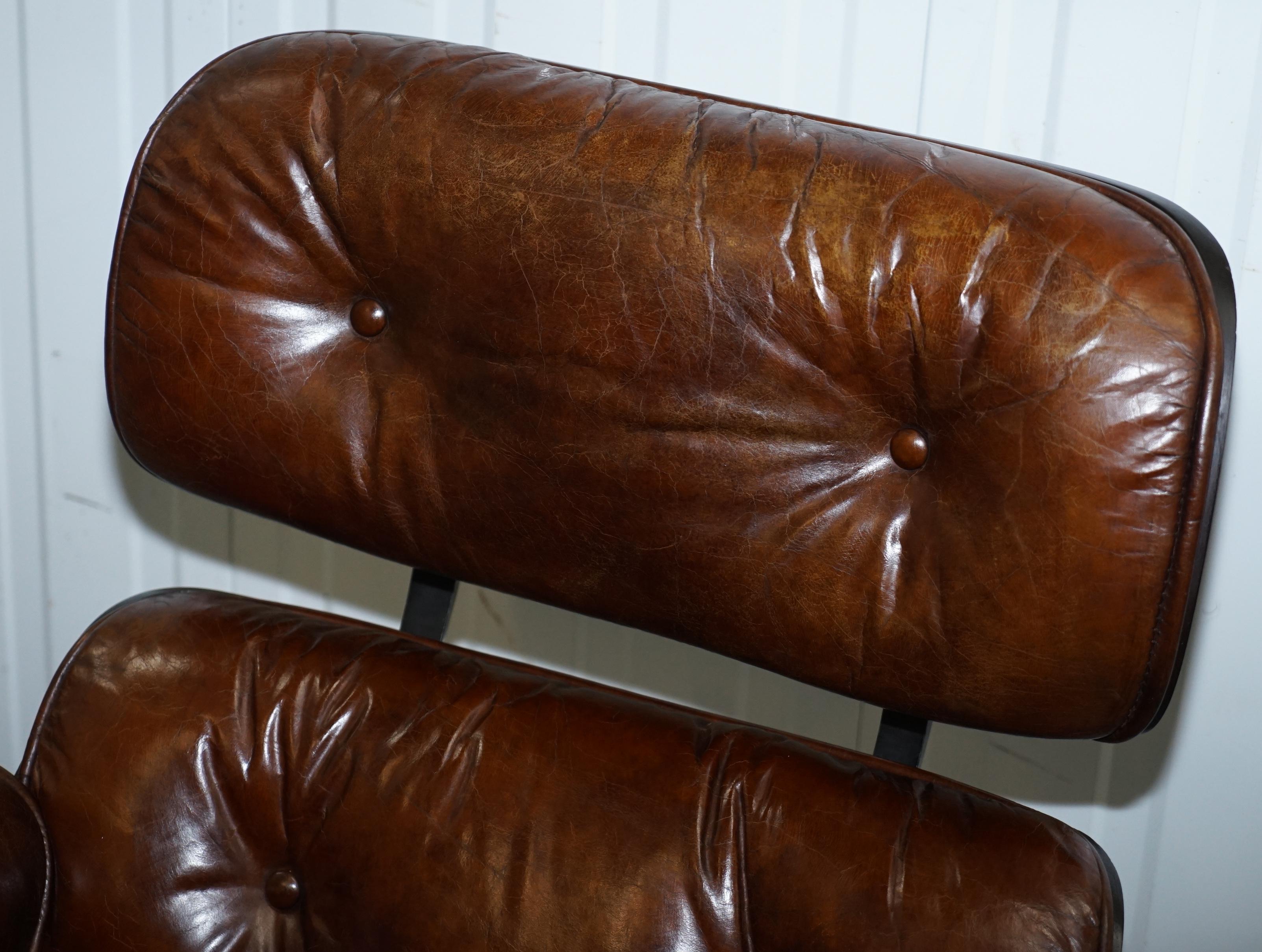 brown leather lounge chair with ottoman