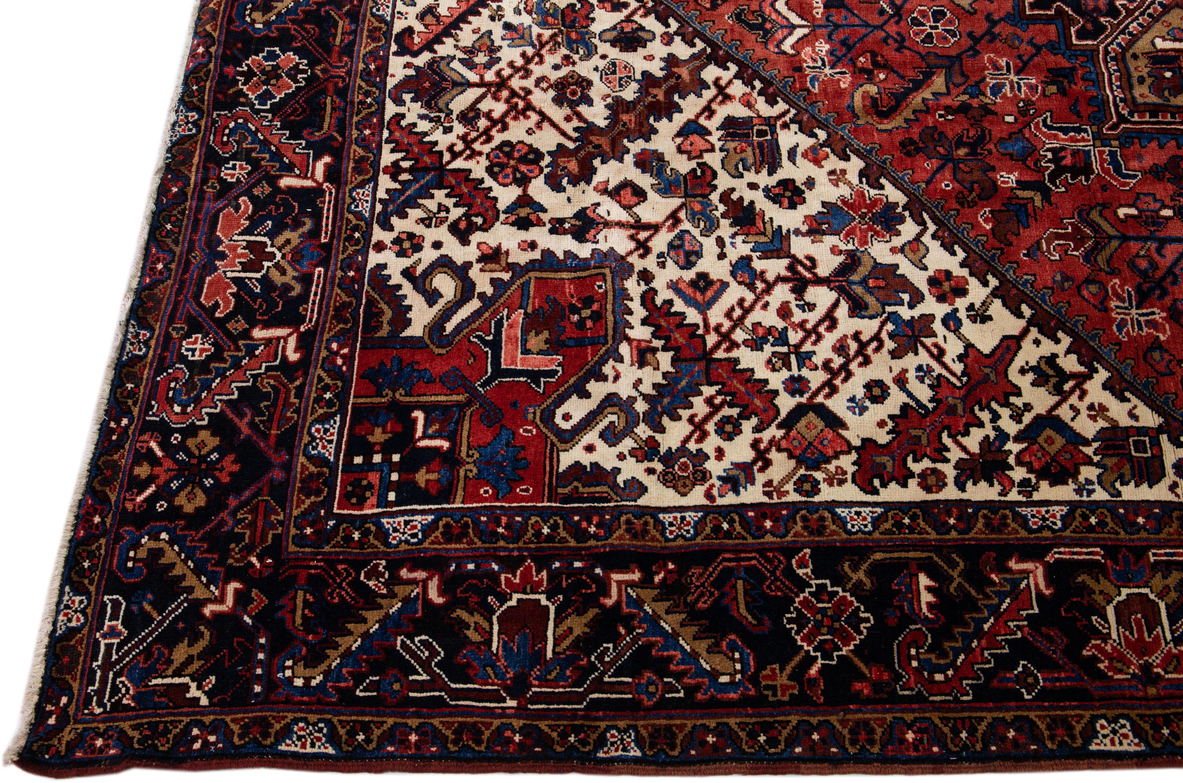 Persian Vintage Heriz Handmade Medallion Motif Red Wool Rug For Sale