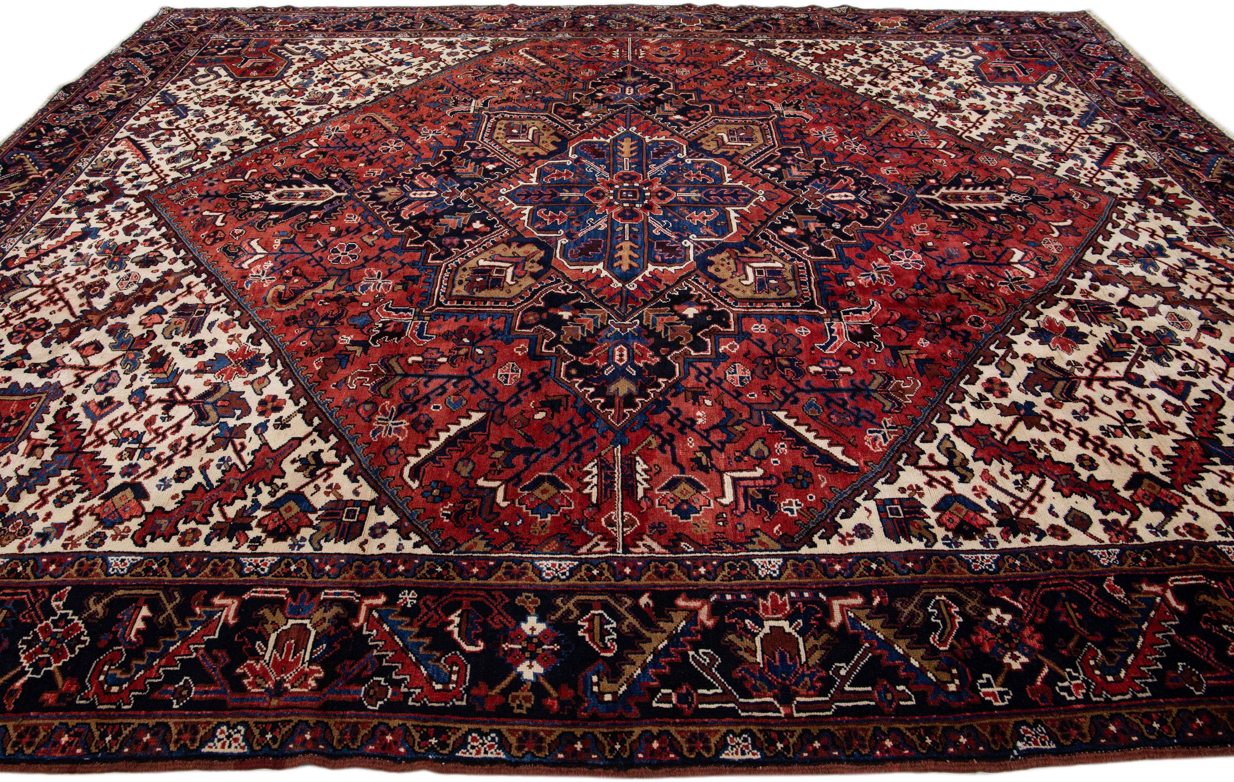 Hand-Knotted Vintage Heriz Handmade Medallion Motif Red Wool Rug For Sale