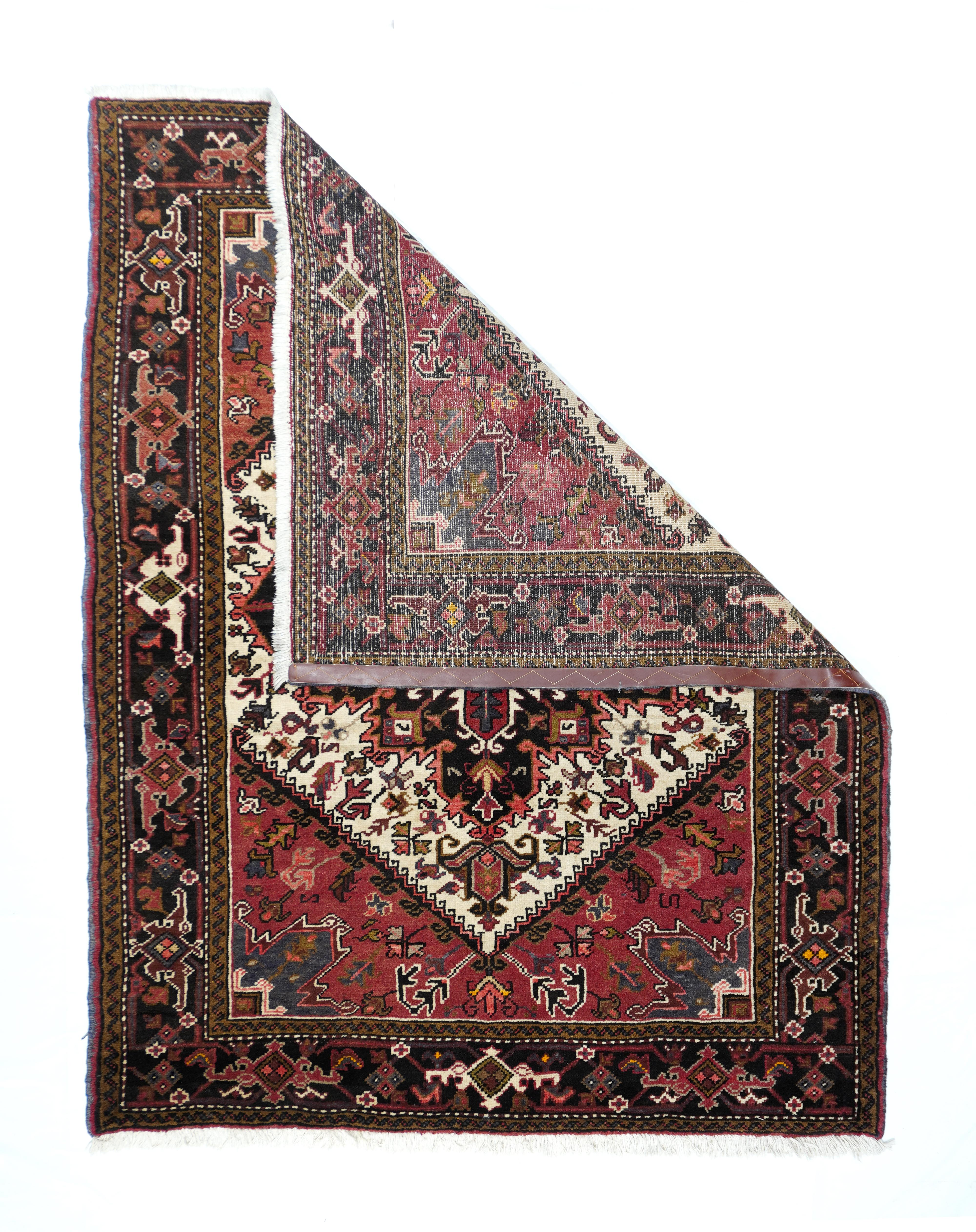 Vintage Heriz Rug 5' x 8'3''. The Heriz weaving district in NW Persia (Azerbaijan province) has been intensely active from the 18th century onward, with literally millions of mostly medallion, mostly room size carpets in a primarily red/ ecru and