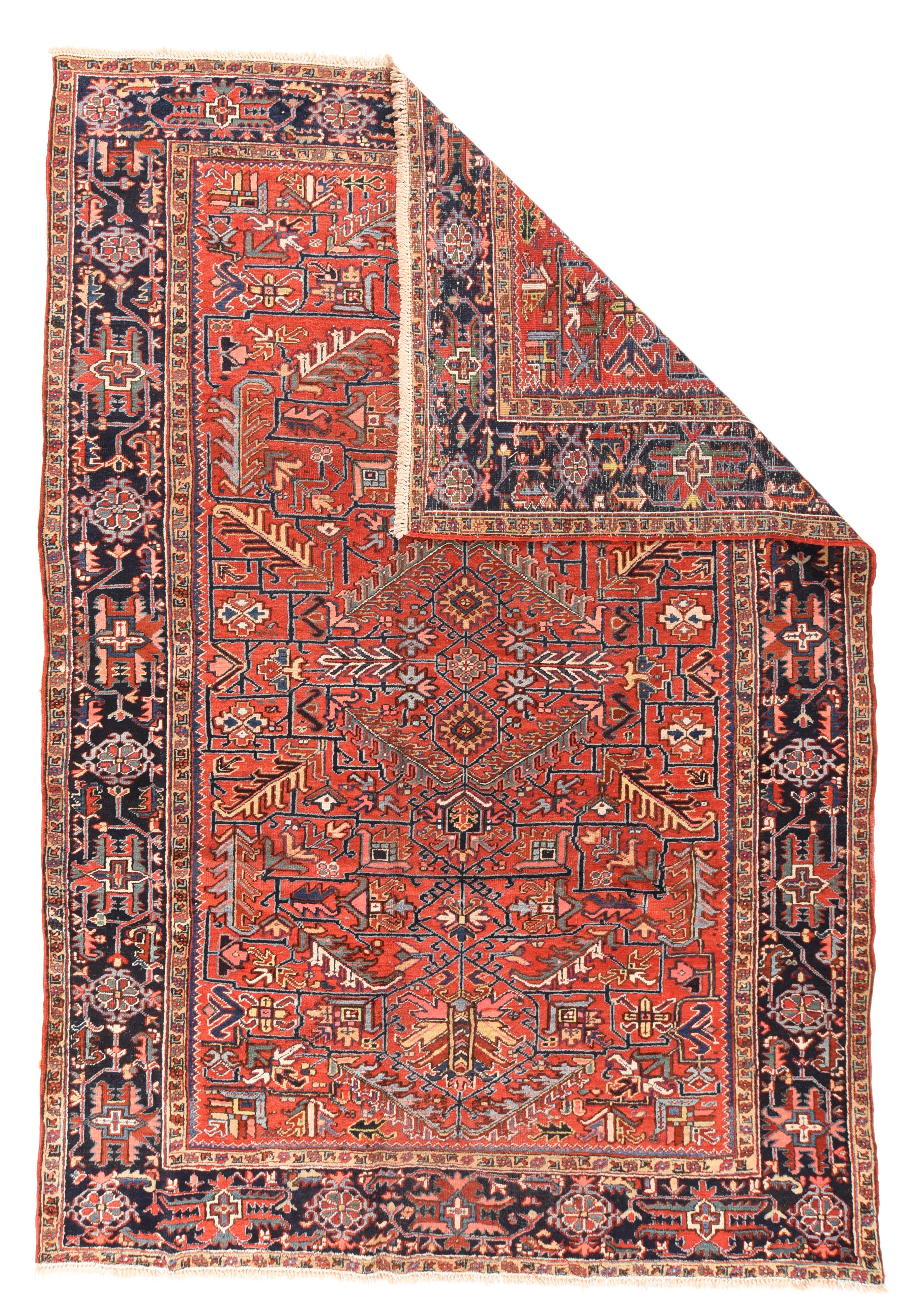 Vintage Heriz rug. Measures: 7.8'' x 11'. Iconically Mehriban, with a soft red red ground supporting a plethora of fringed and flame-edged bitonal leaves in straw, cream, chocolate, palest blue and light teal blue. An ashik, herringbone leaf and