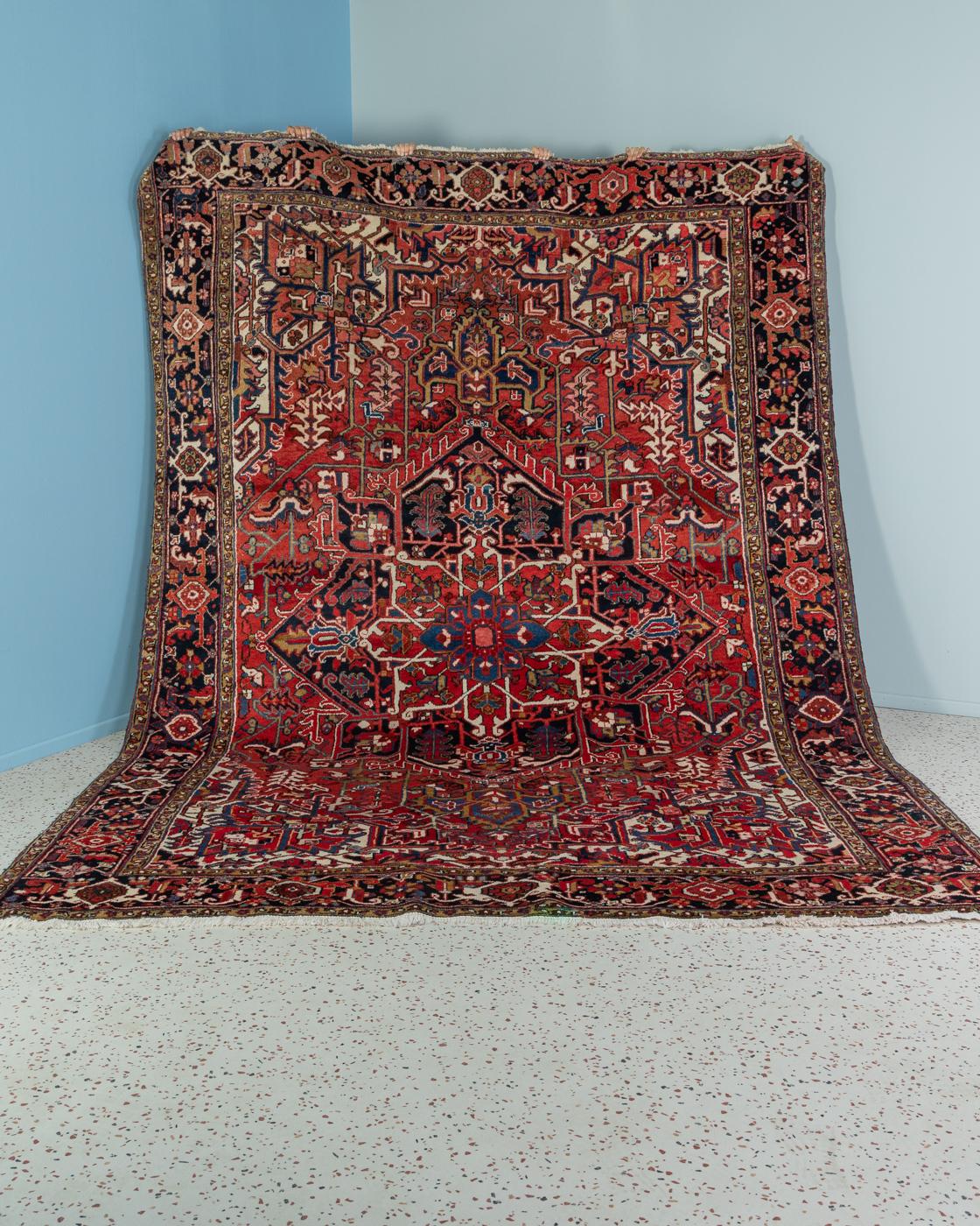 Classic rug from the 1960s, from the city of Heriz in northwestern Persia. High-quality pile in shades of red, orange, dark blue, cream and beige.

Quality Features:
 Heriz carpet
 Hand knotted
 approx. 160,000 knots per m2
 50-60 years old
