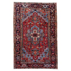 Vintage Heriz Rug with Crimson Field and Sky Blue Medallion