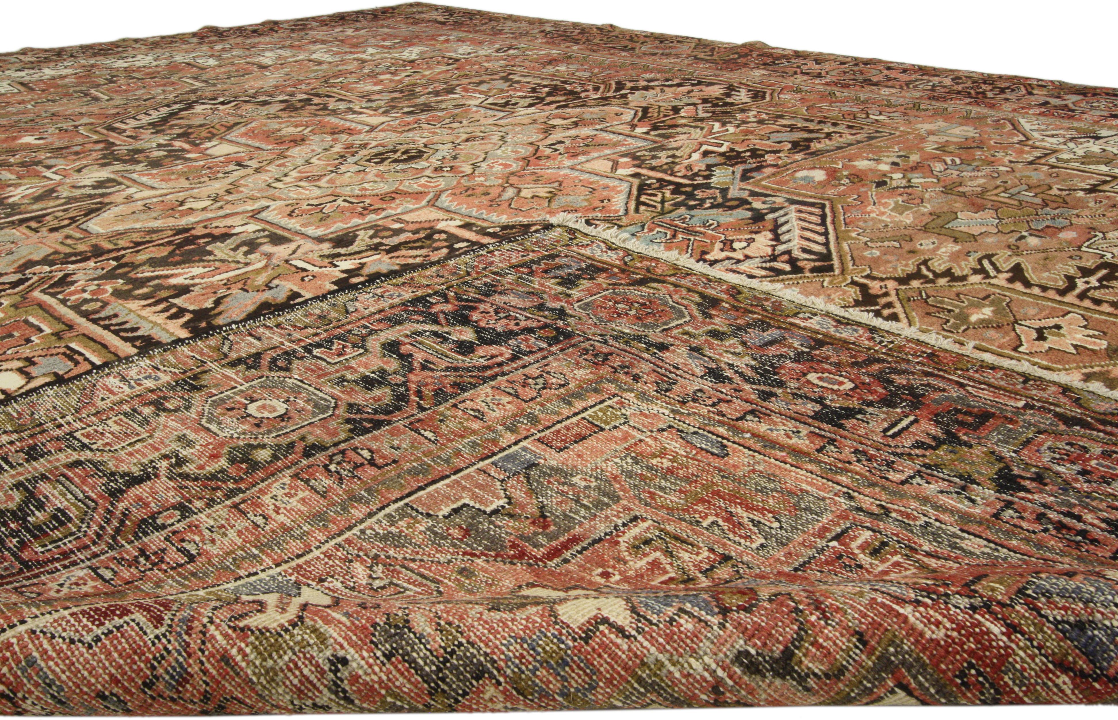 Persian Vintage Heriz Rug with Luxe Style and Warm, Rustic Colors For Sale