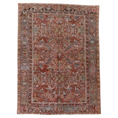Vintage Heriz Rug with Soft Terracotta Field and Blue-Green Botanical Motifs