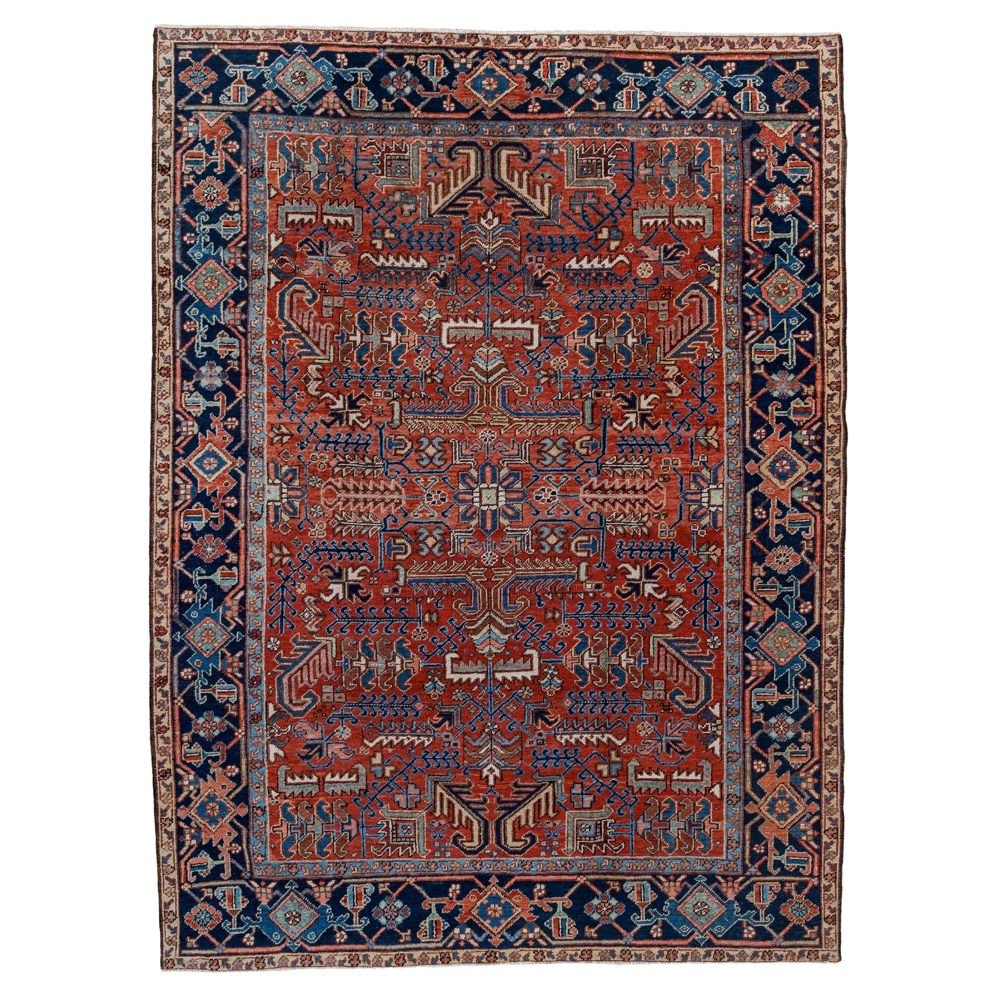 Alfombra Heriz Vintage con Campo de Terracota y Detalle de Borde Añil