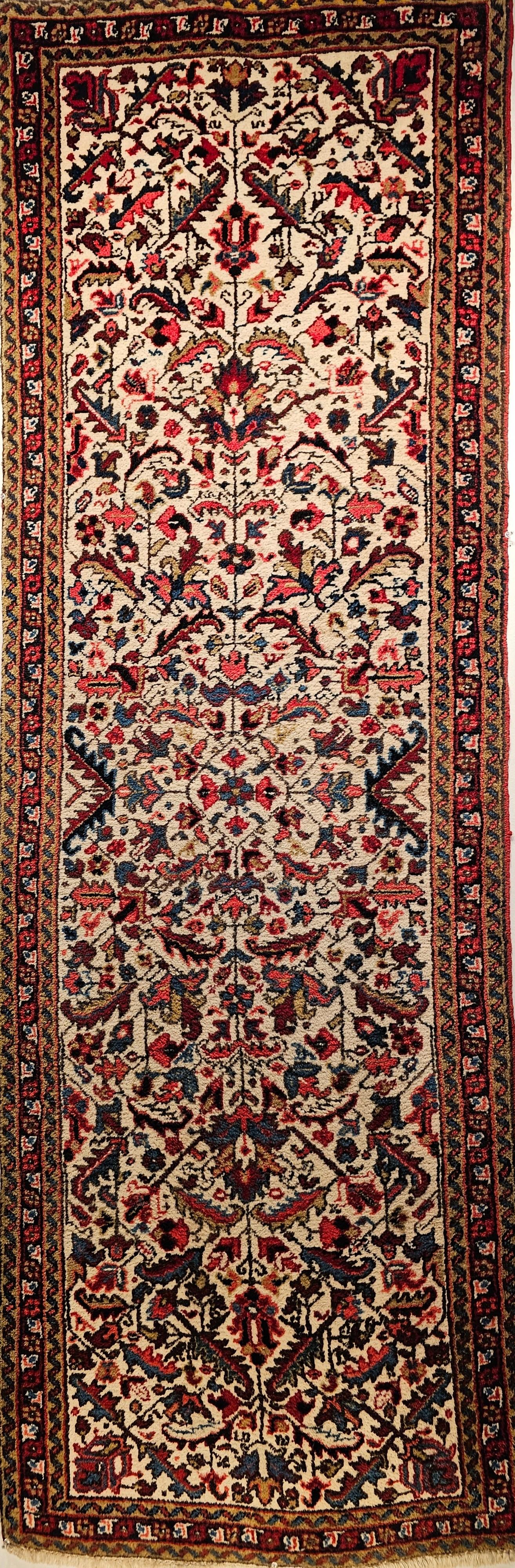  Vintage Persian Heriz runner in an allover geometric pattern set on a very rare ivory color background.   This Heriz runner was woven in the second quarter of the 1900s.  It is very unique and extremely rare in having an allover design which is a