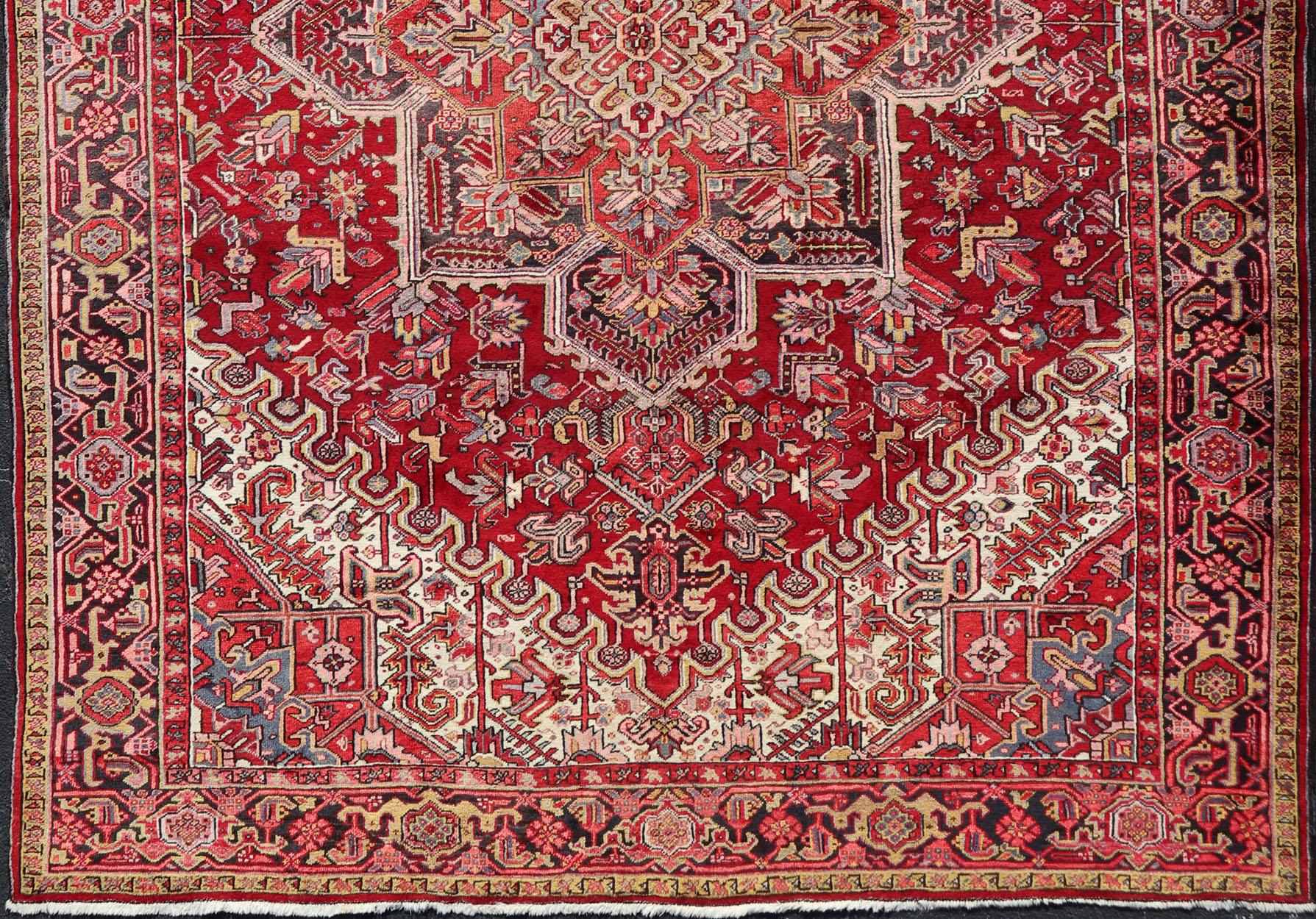 Vintage Persian Heriz rug, rug PTA-21023, country of origin / type: Persian / Heriz, circa Mid-20th Century.

This Vintage Heriz rug, hailing from northwestern Iran (circa 1950's), features a central medallion design surrounded by exquisitely
