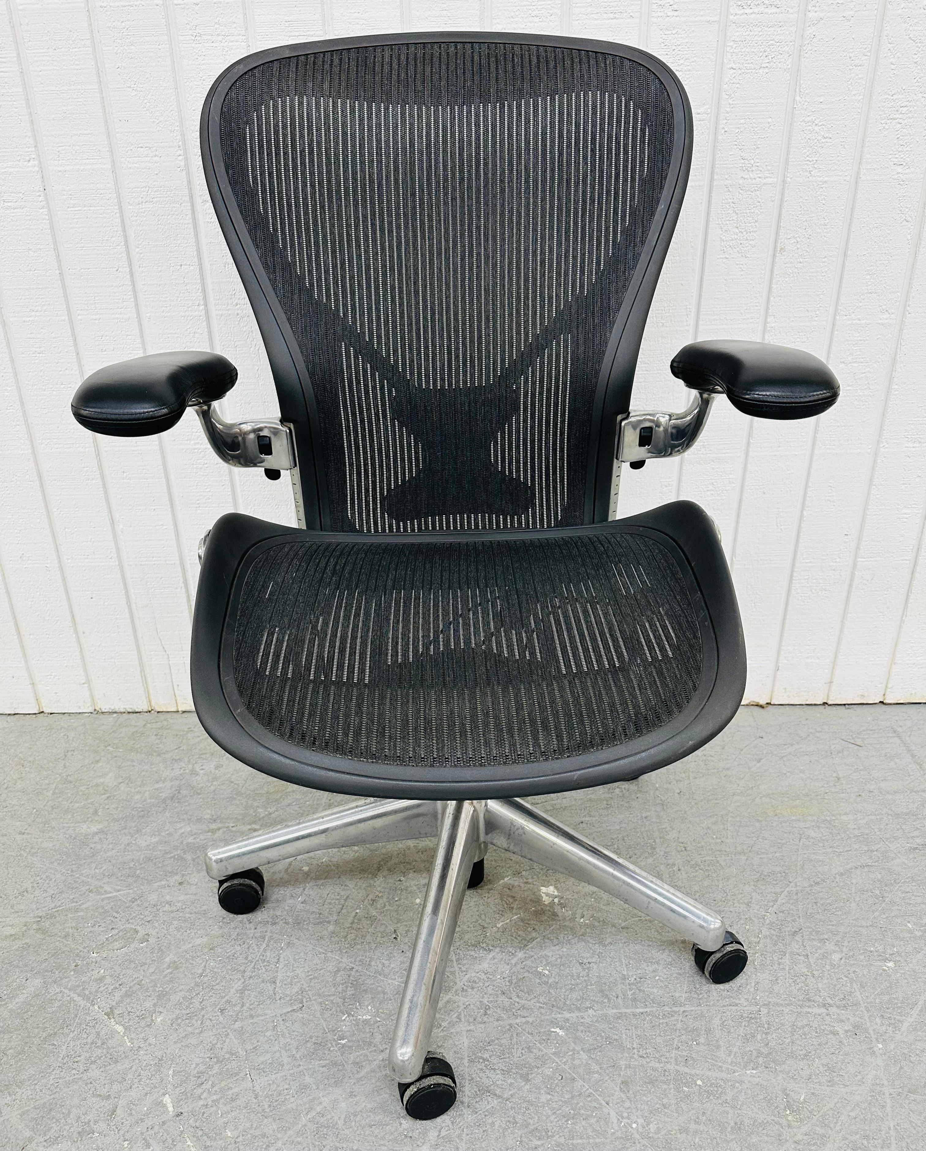 This listing is for a Vintage Herman Miller Aeron Office Desk Chair. Featuring lumbar support, polished aluminum, tuxedo pellicle, and black leather arm rests. This is an exceptional combination of quality and design by Herman Miller!