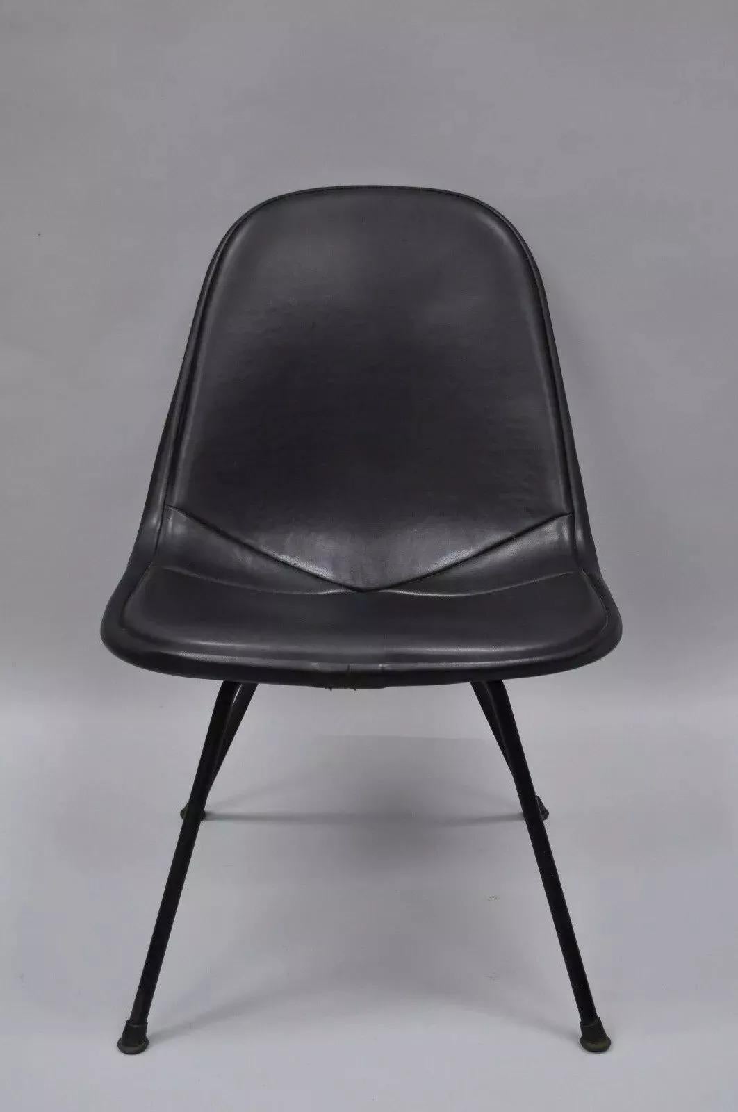 Herman Miller Vintage Eames DKX Chair Black Upholstered Padded Vinyl Wire Frame Chair. Item featured is believed to be an original 1st edition vinyl upholstered DKX chair on its original low ‘X’ base. Herman Miller tag to underside. Circa Mid 20th
