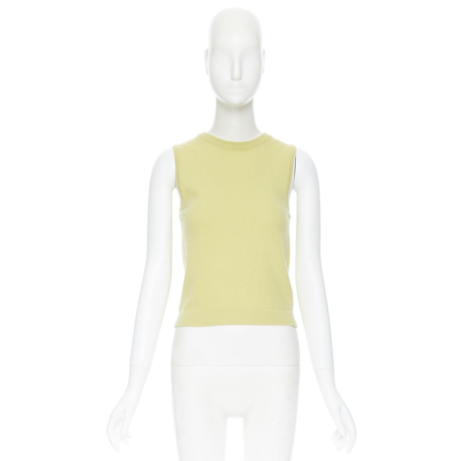 vintage HERMES 100% pure cashmere yellow knitted short sleeveless vest sweater S 
Reference: LACG/A00233 
Brand: Hermes 
Material: Cashmere 
Color: Yellow 
Pattern: Solid 
Extra Detail: Pure cashmere comfort. 
Made in: Scotland