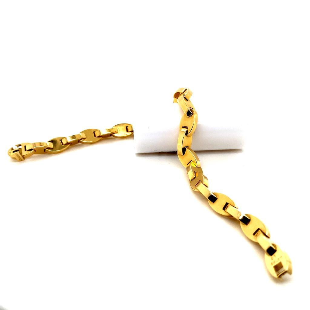 A Vintage Hermès 18 Karat Yellow Gold Bracelet, Circa 2000

An incredibly wearable, comfortable piece of Retro Hermès; each section of this cable link chain has a plain polished finish.

Signed
'HERMES', stamped 750 Assay marks for France, numbered
