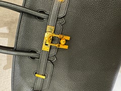 Vintage Hermes 2001 L’Homme Peut Gold Cadena Lock Charm