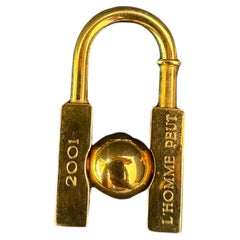 Vintage Hermes 2001 L’Homme Peut Gold Cadena Lock Charm