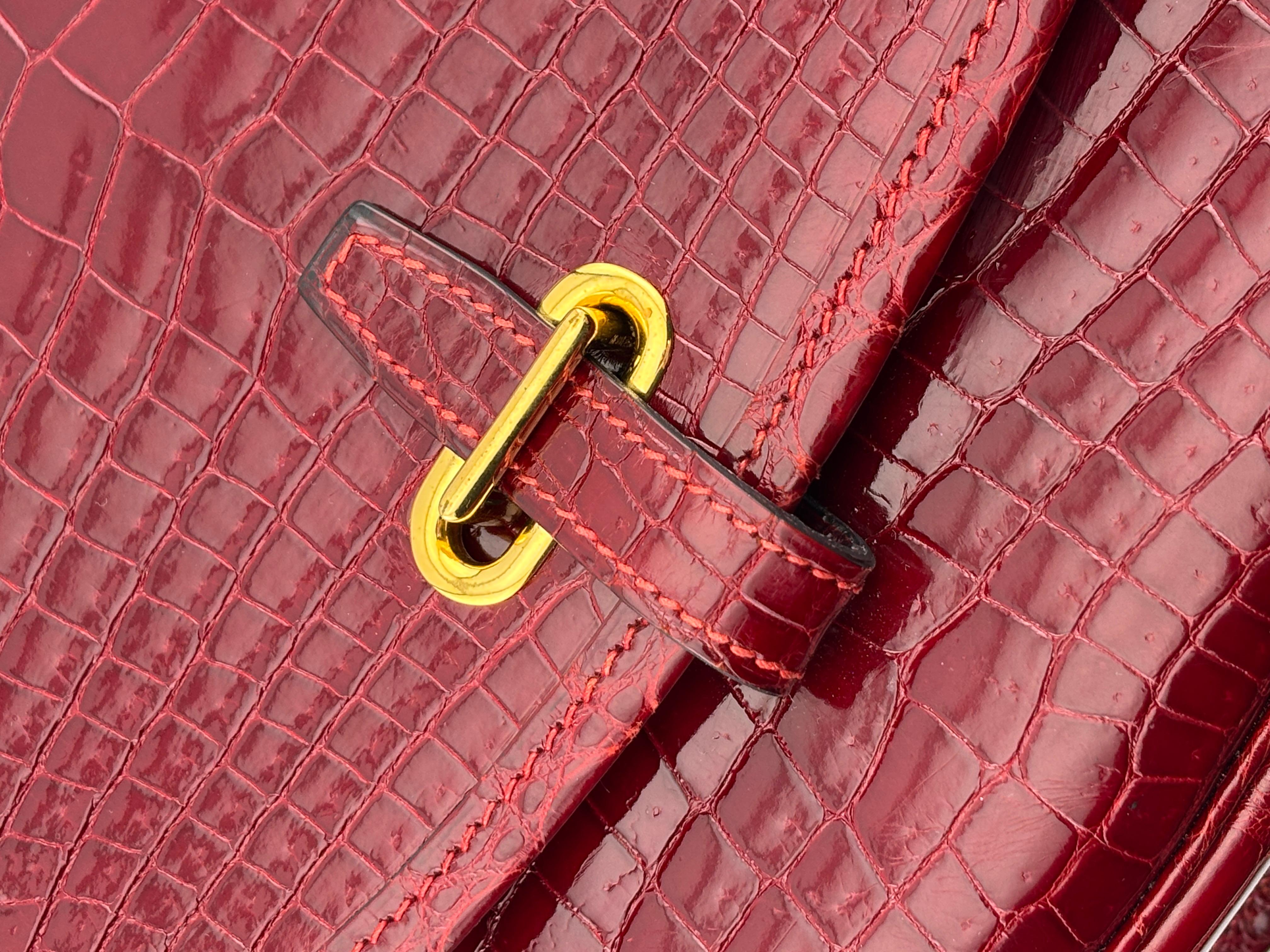 Vintage Hermes Crocodile Handbag. You can choose to wear this handbag using the long strap or switch to short strap.

Dimensions: 9 inches x 7 inches x 3 inches
Long strap 38 inches
Short strap 17 inches
Strap width 1.25 inches
Late 20th