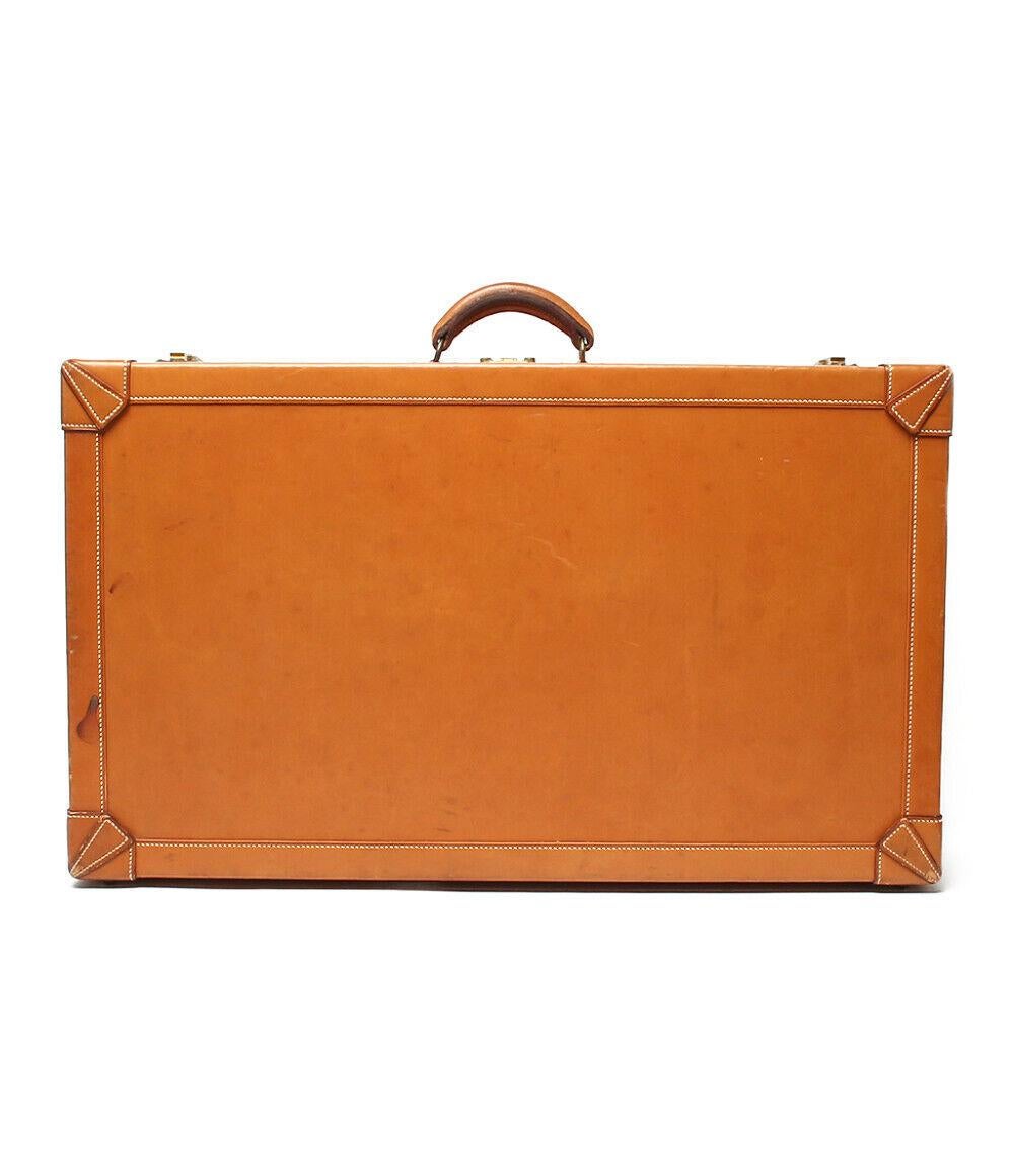 Vintage HERMES Leather suitcase, with brass locks, cotton interior with leather straps. Leather handle all Original. Locks are stamped 