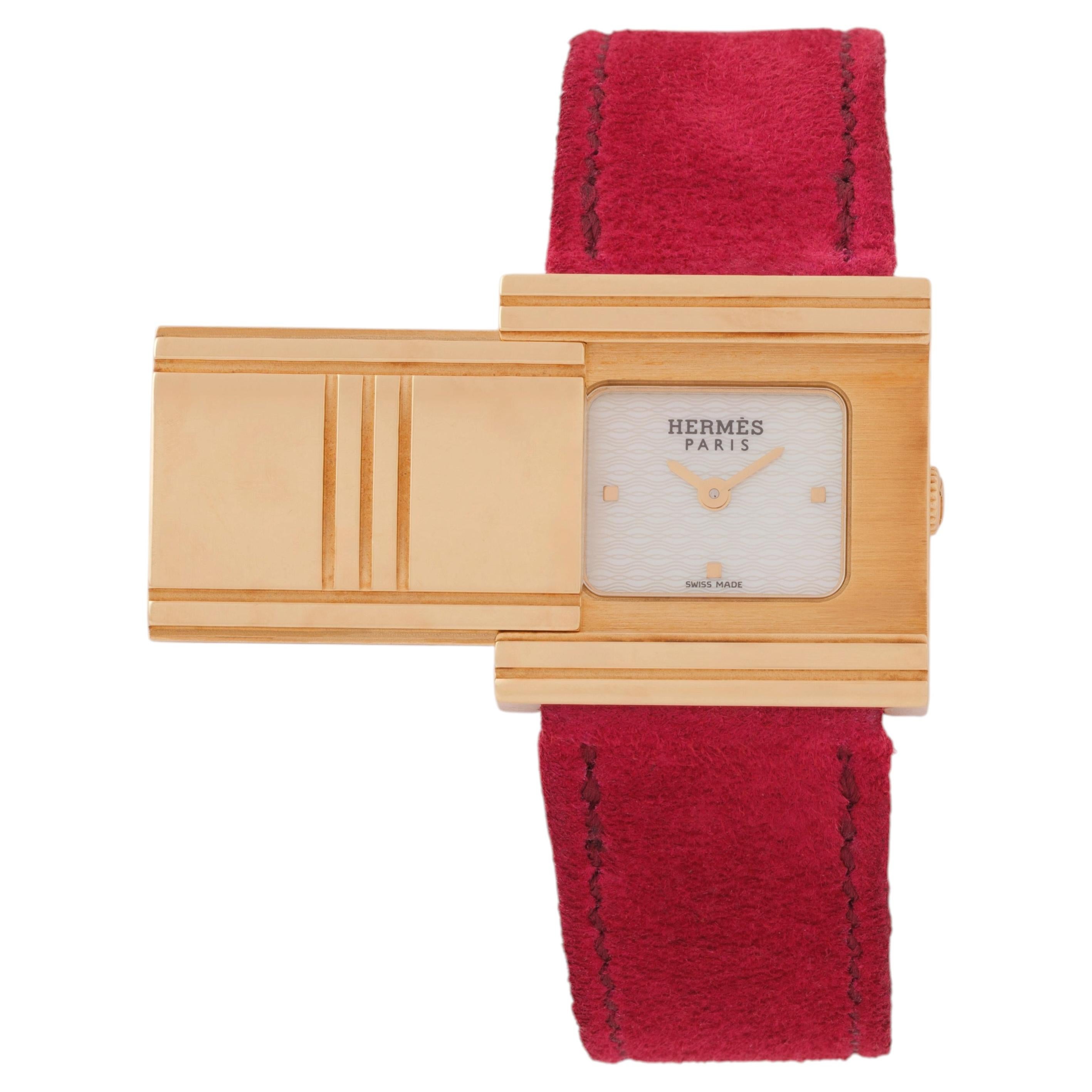Reloj vintage Hermès Glissard de cuarzo, con caja de oro amarillo de 18 quilates y esfera de nácar