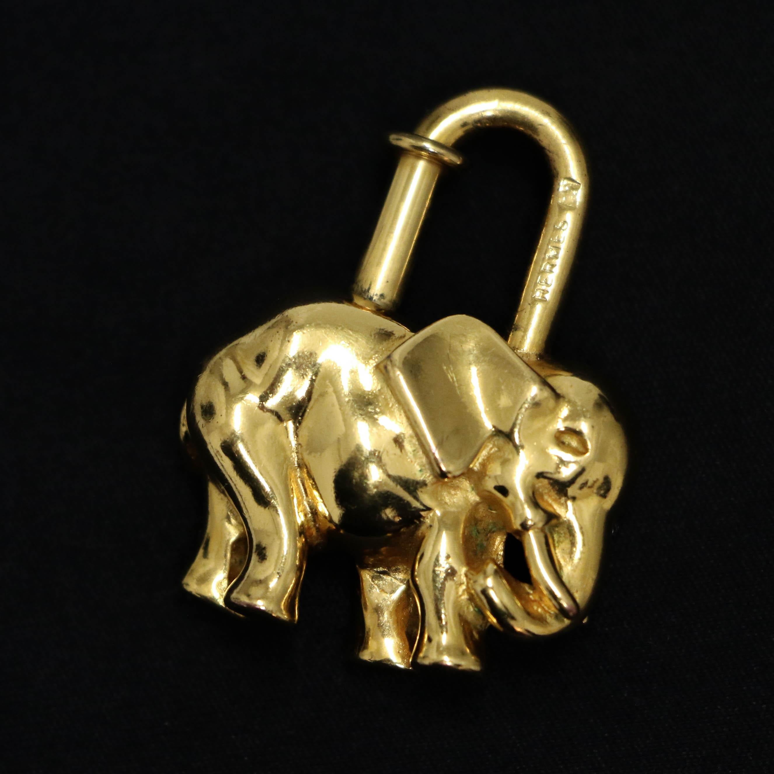 Brown Vintage Hermès golden elephant Lock