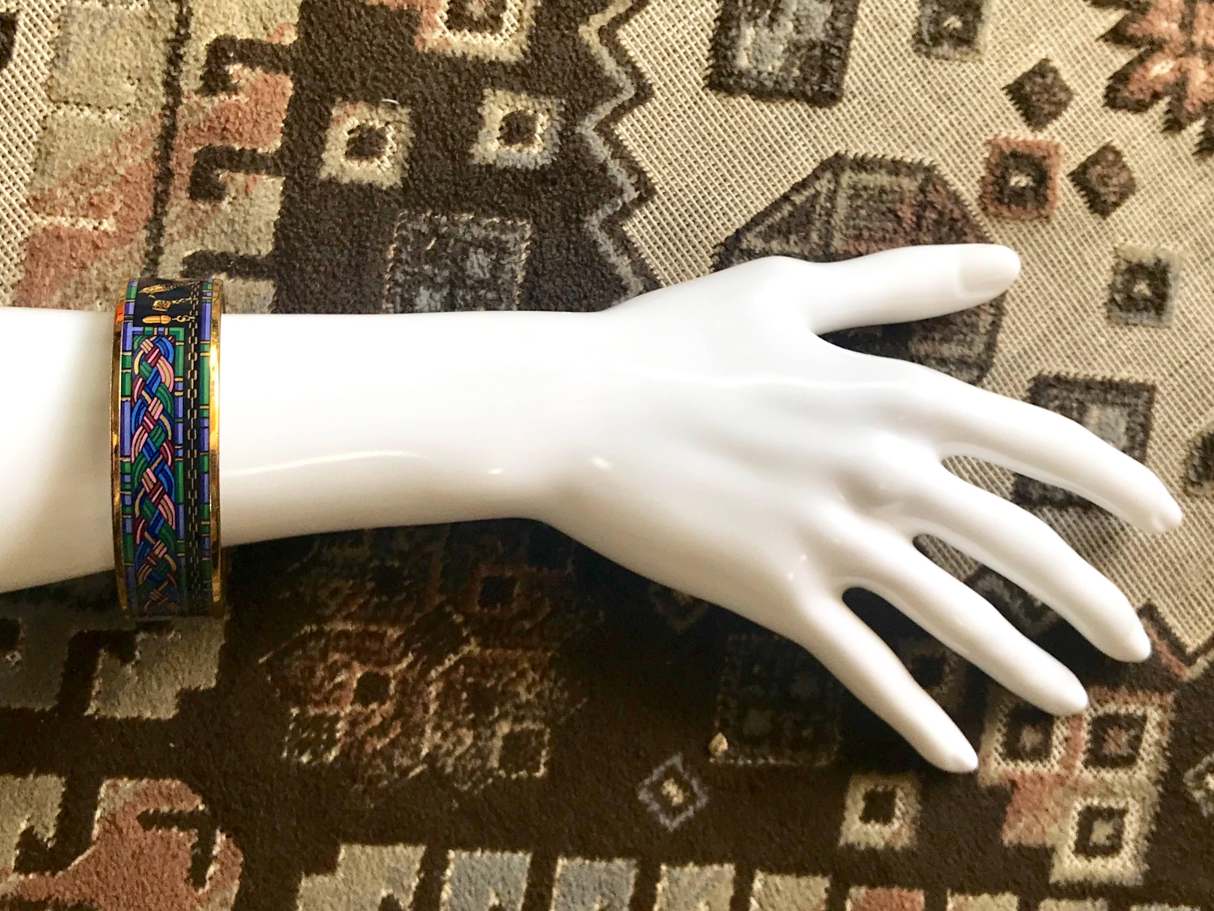1990s. Vintage Hermes golden enamel/cloisonné bangle, bracelet with blue, purple, green, pink etc multicolor. Scissors, Jewelry case illustration. Beautiful classic jewelry from Hermes.

Introducing a fantastic bangle from HERMES....
The iconic