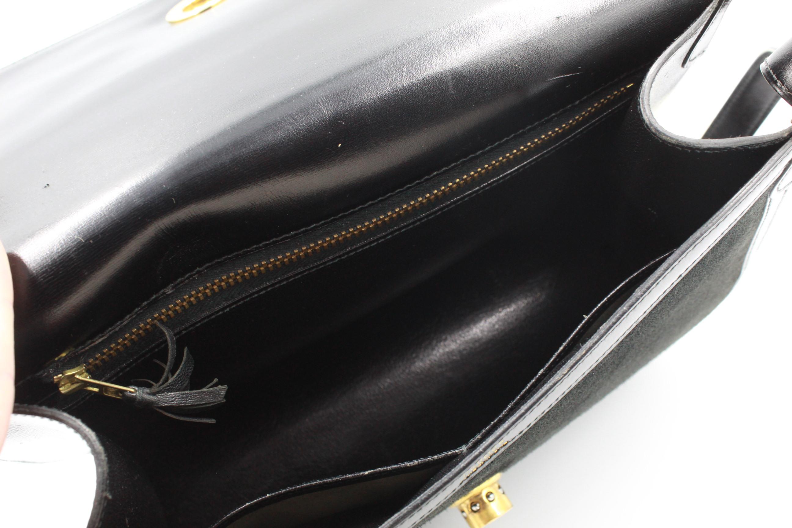 Vintage Hermès handbga with shoulder strap in black leather and suede. For Sale 1