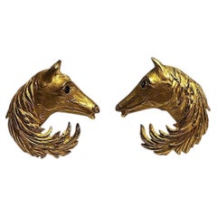 Vintage-Ohrclip von Hermès in Form eines Pferdeohrs aus Gold und Saphir