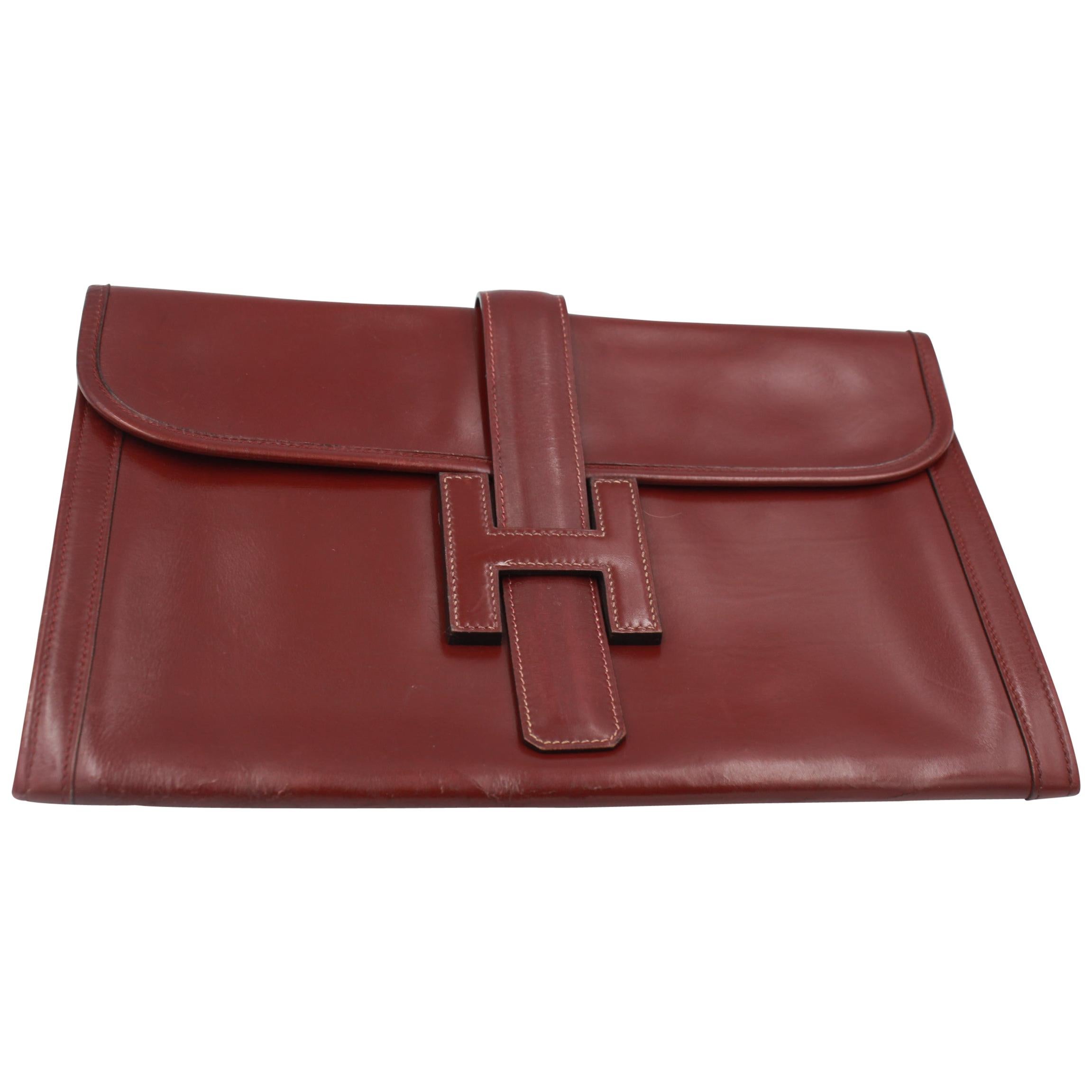 Vintage Hermes Jige  Clutch in Burgundy box Leather.