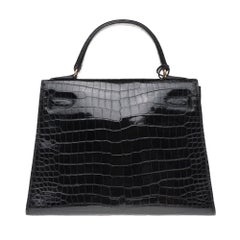 Vintage Hermès Kelly 28 handbag in black Crocodile Porosus and gold hardware