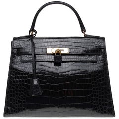 Vintage Hermès Kelly 28 handbag in black Crocodile Porosus and gold hardware