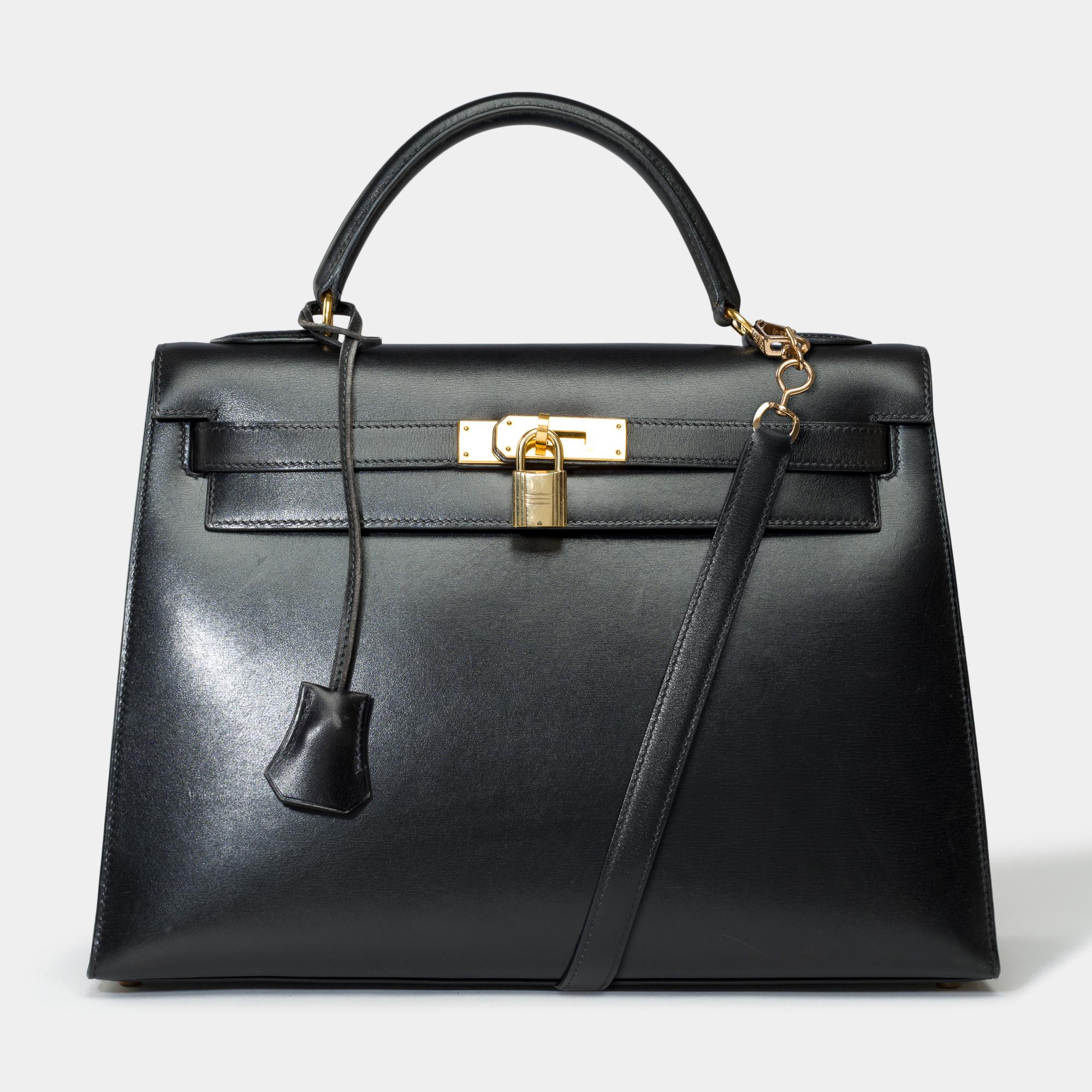 Beautiful​ ​Hermès​ ​Kelly​ ​32​ ​sellier​ ​handbag​ ​strap​ ​in​ ​black​ ​box​ ​calf​ ​leather,​ ​gold​ ​plated​ ​metal​ ​trim,​ ​compatible​ ​removable​ ​shoulder​ ​strap​ ​not​ ​original​ ​(not​ ​signed​ ​Hermès)​ ​in​ ​black​ ​box​ ​leather​ ​,​