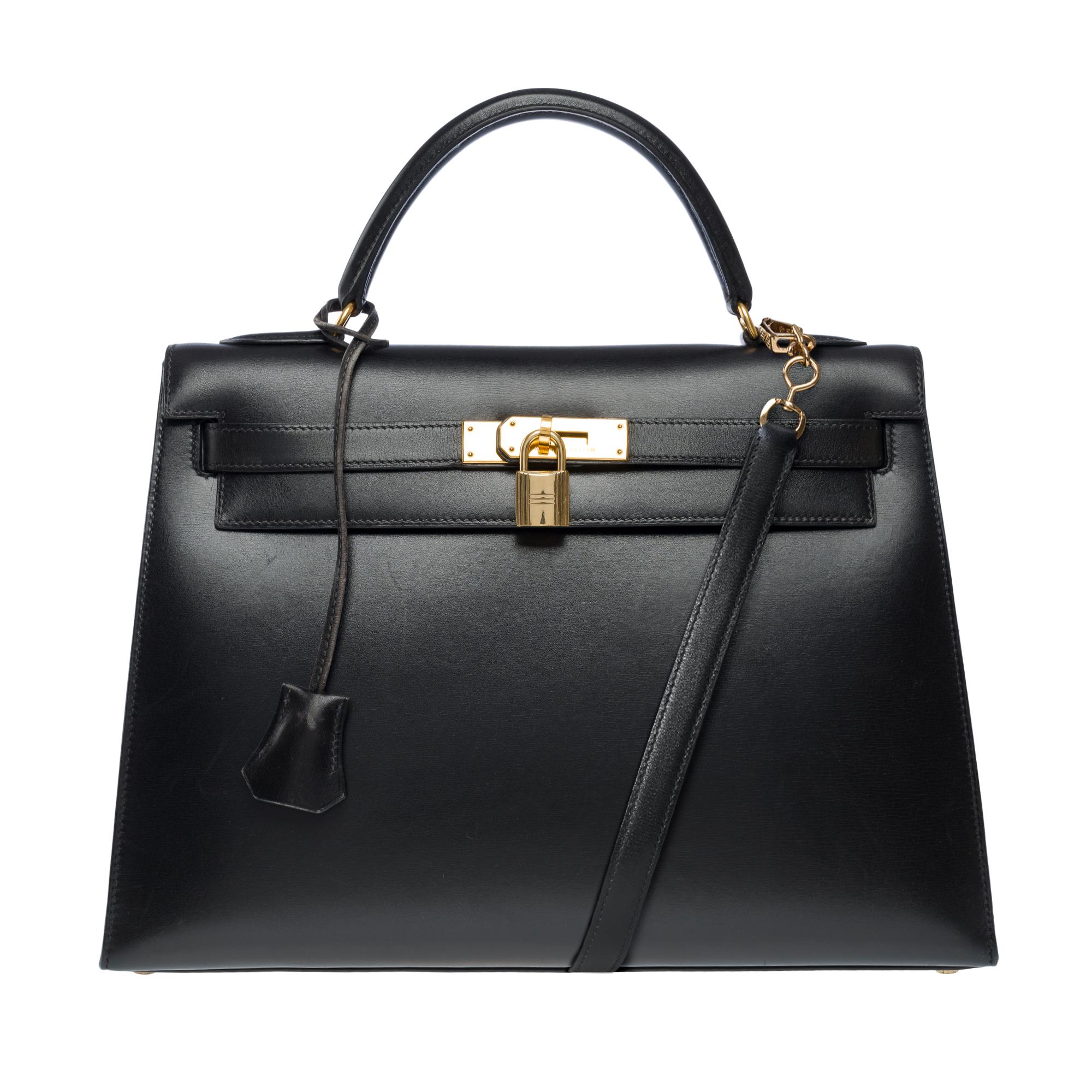 Orange Vintage Hermès Kelly 32 sellier handbag strap in Black Box Calf leather, GHW