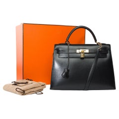 Vintage Hermès Kelly 32 sellier handbag strap in Black Box Calf leather, GHW