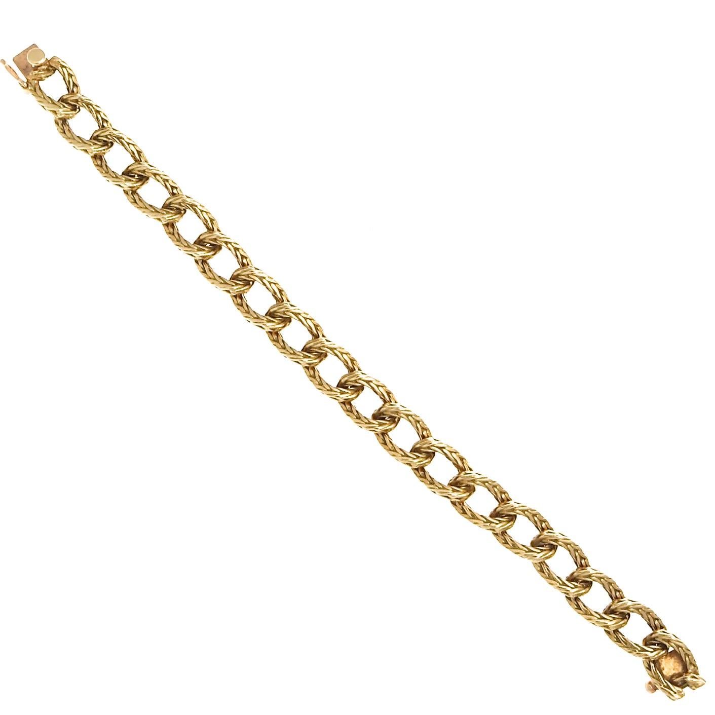 From the jewelry house of Hermes Paris, we found the perfect link bracelet in yellow gold. With woven links that give it a beautiful hand crafted texture, le bracelet will add a vintage vibe to your wrist stack.  Circa 1960s. 7-1/4 inches long x